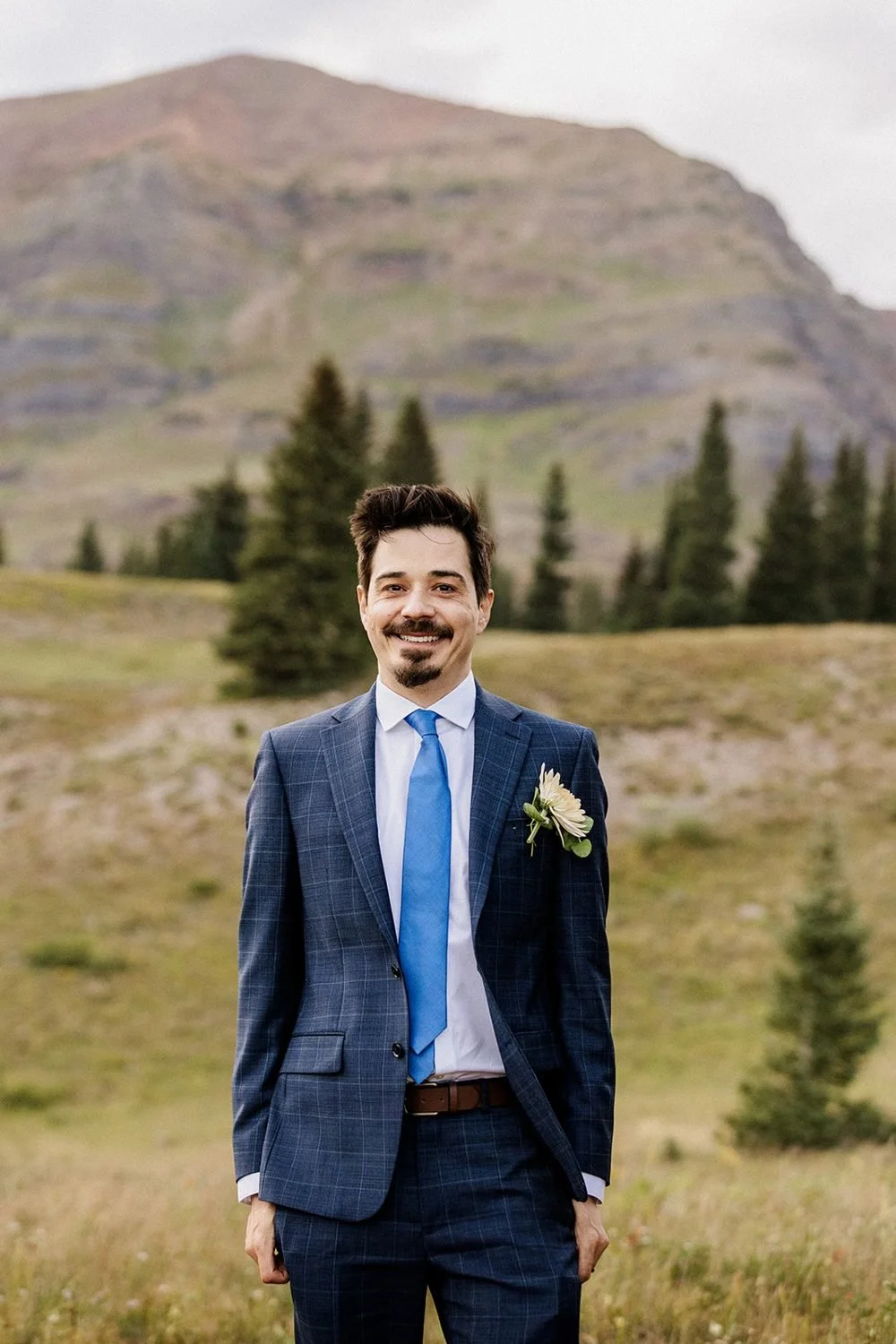 lake-irwin-elopement-crested-butte-75-groom-portrait-evening.jpg