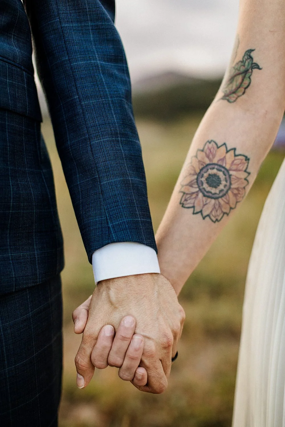 lake-irwin-elopement-crested-butte-94-holding-hands-tattoo-detail.jpg