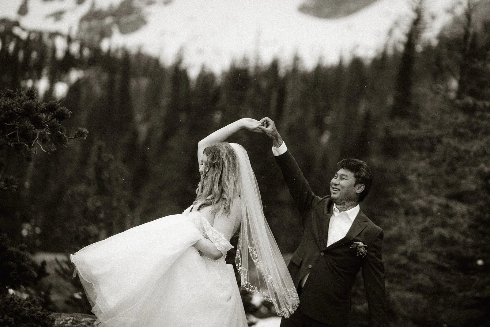 Couple dancing at Dream Lake, in black and white