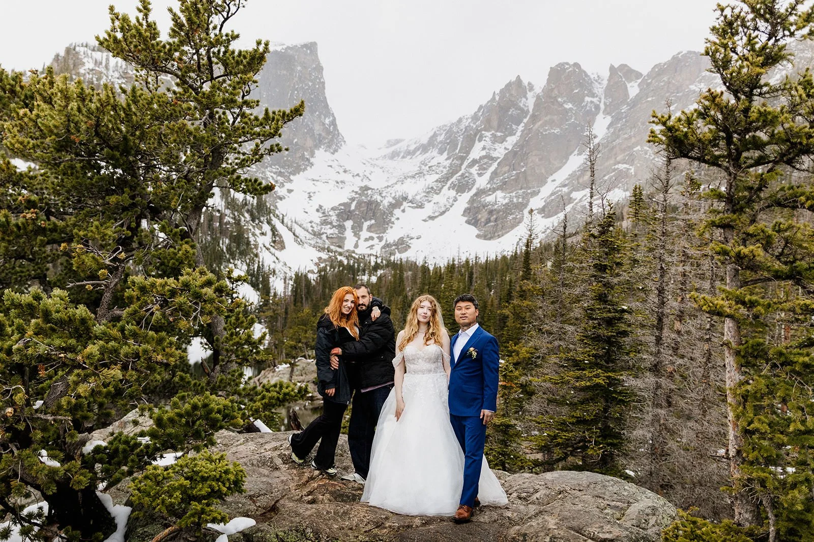 Couple with their two friends at Dream Lake in Rocky Mountain National Park