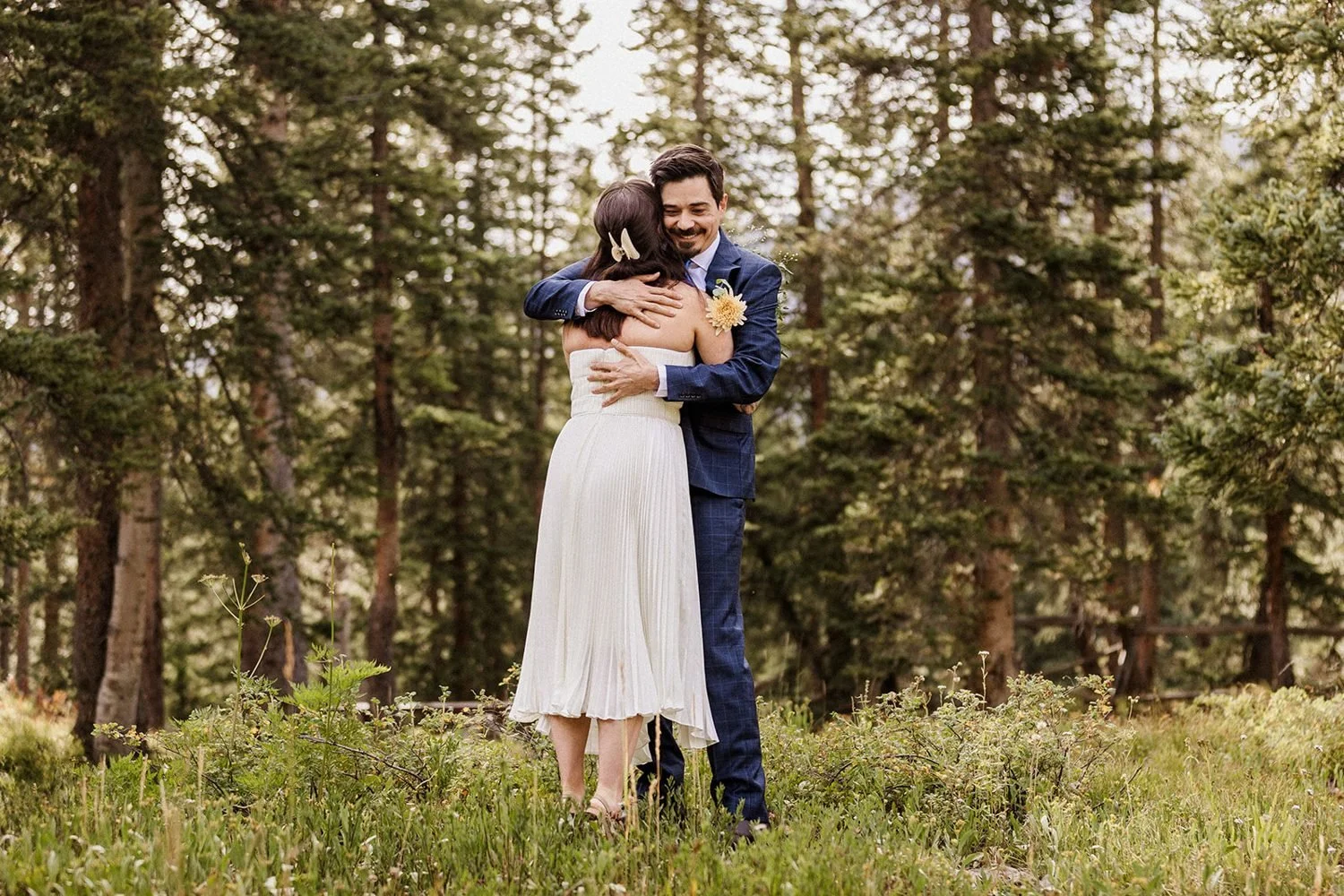 Couple embraces after their first look in Crested Butte