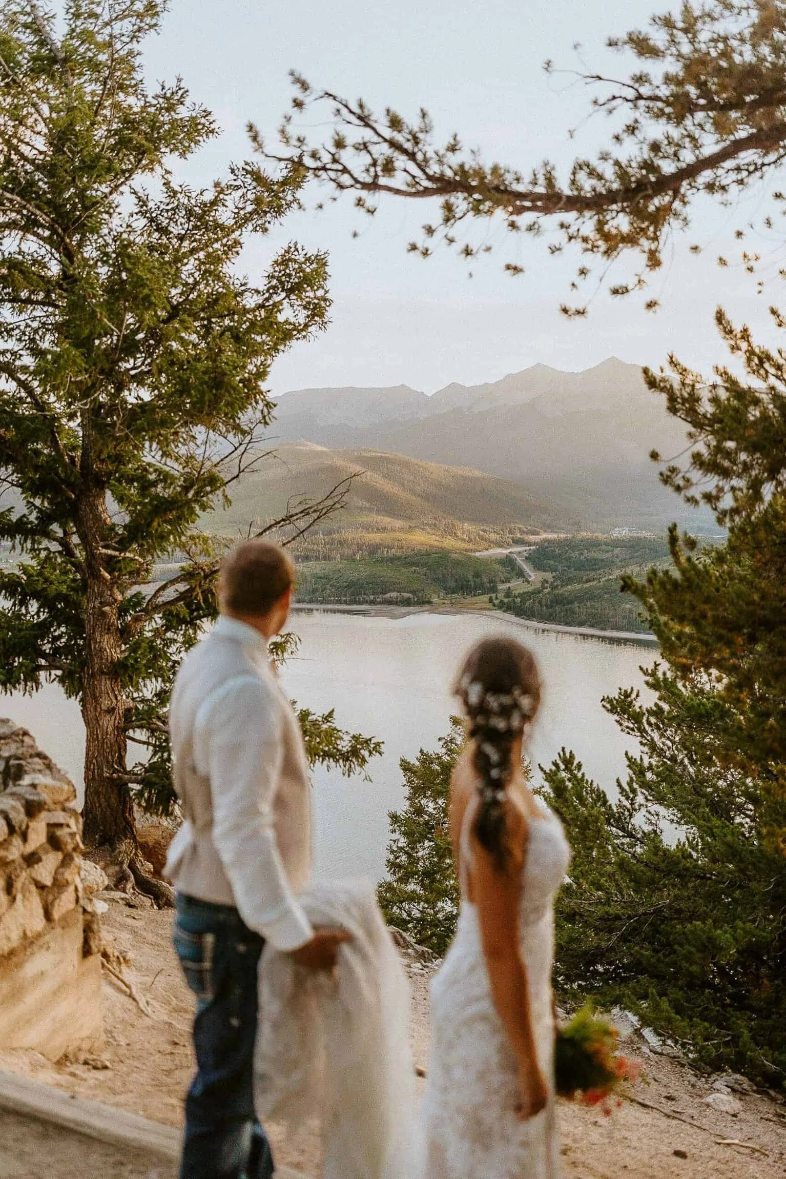 Bride and groom overlooking Sapphire Point