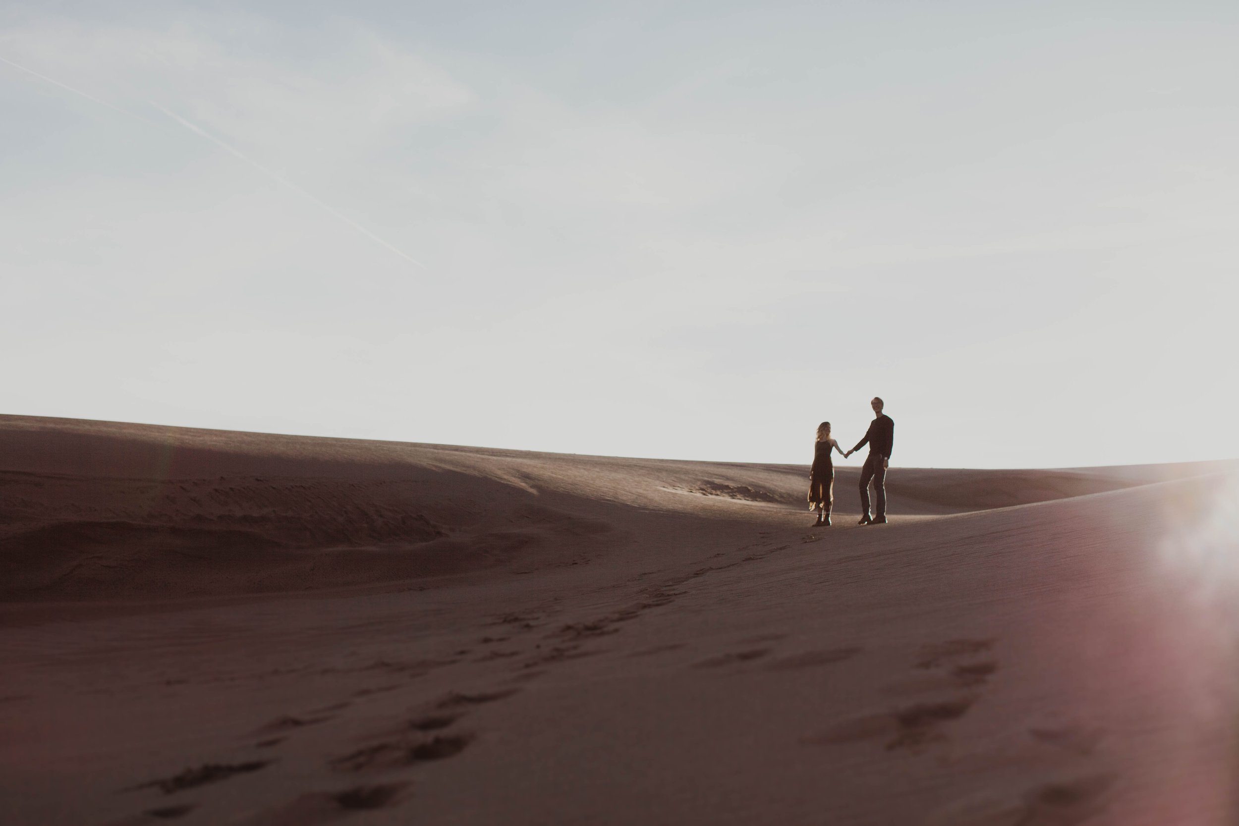 Couple eloping on top of a dune at Great Sand Dunes National Park