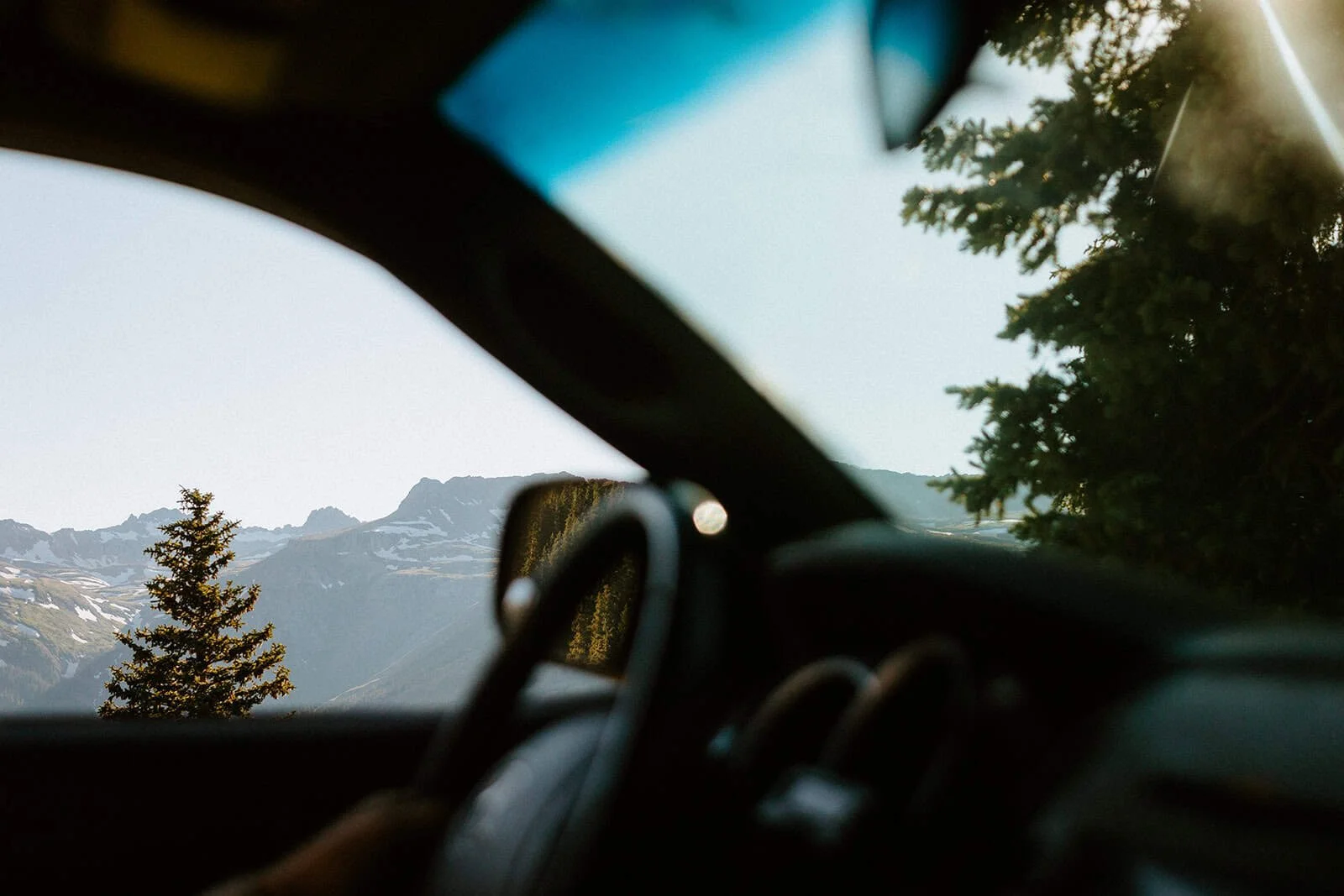 bride and groom on 4x4 road Colorado mountain elopement