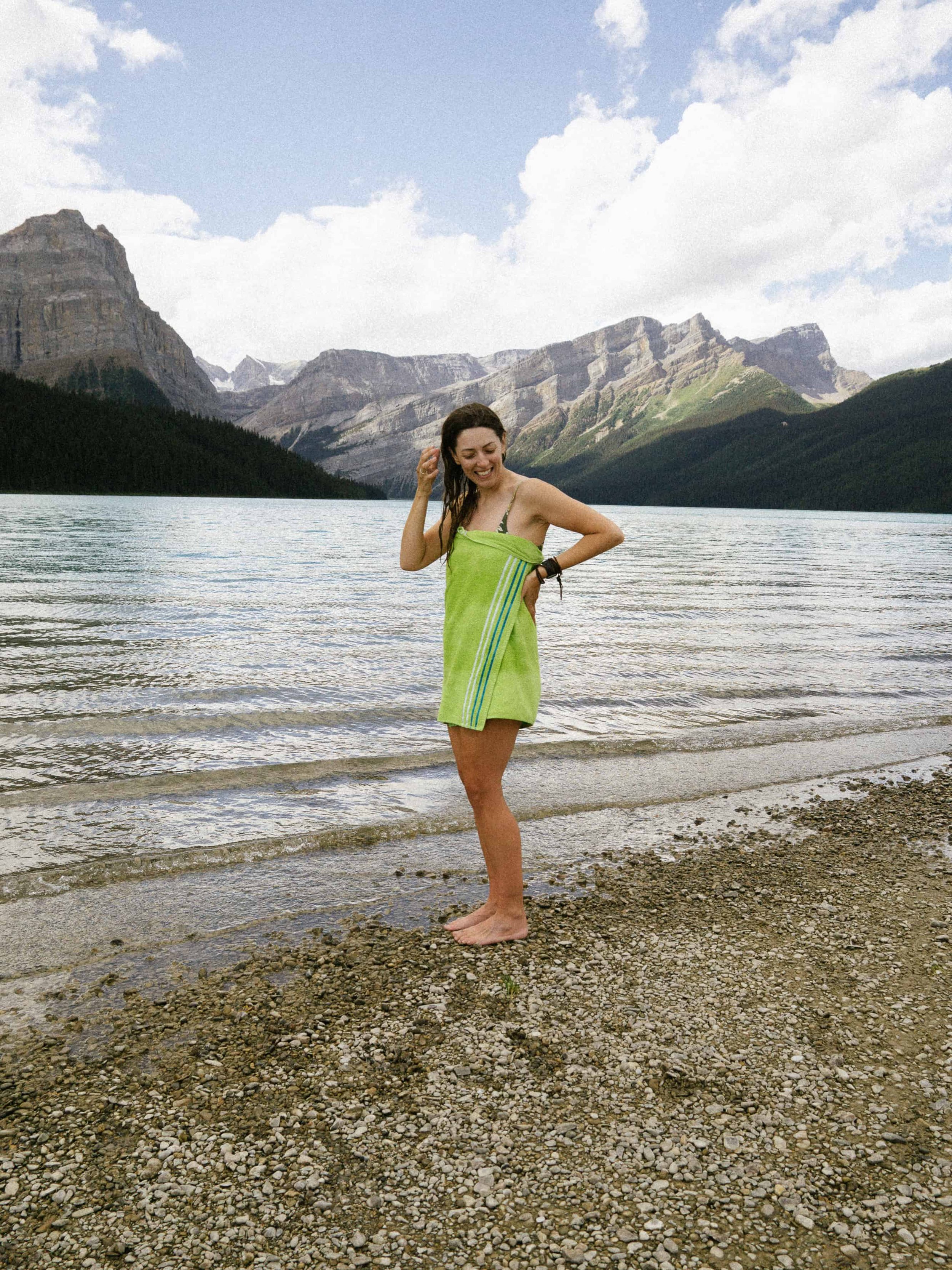 Colorado elopement photographer swimming in an alpine lake