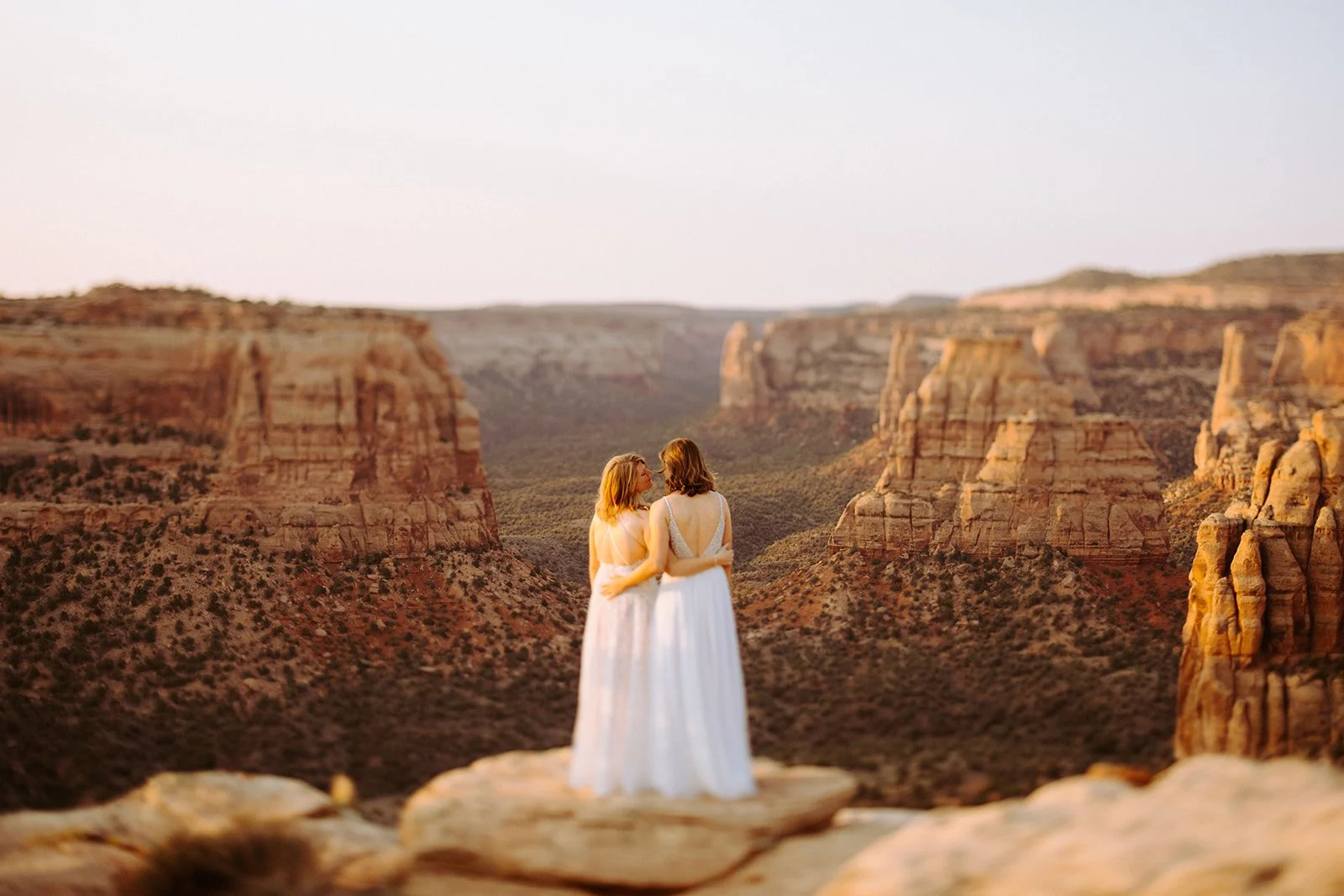 brides elope in colorado national monument overlooking wedding canyon