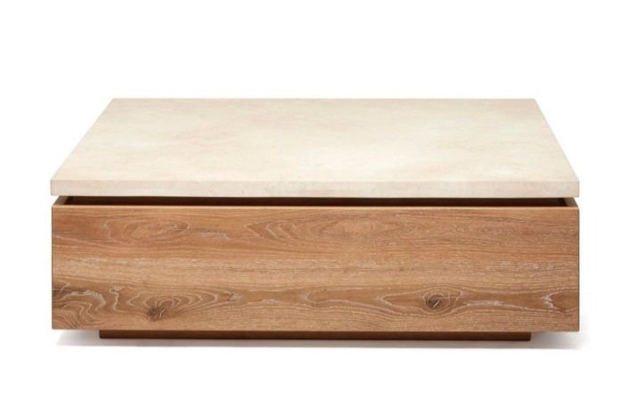 The Branford Storage Cocktail Table and its honey marble top and oak wood base finished in Saddle.
