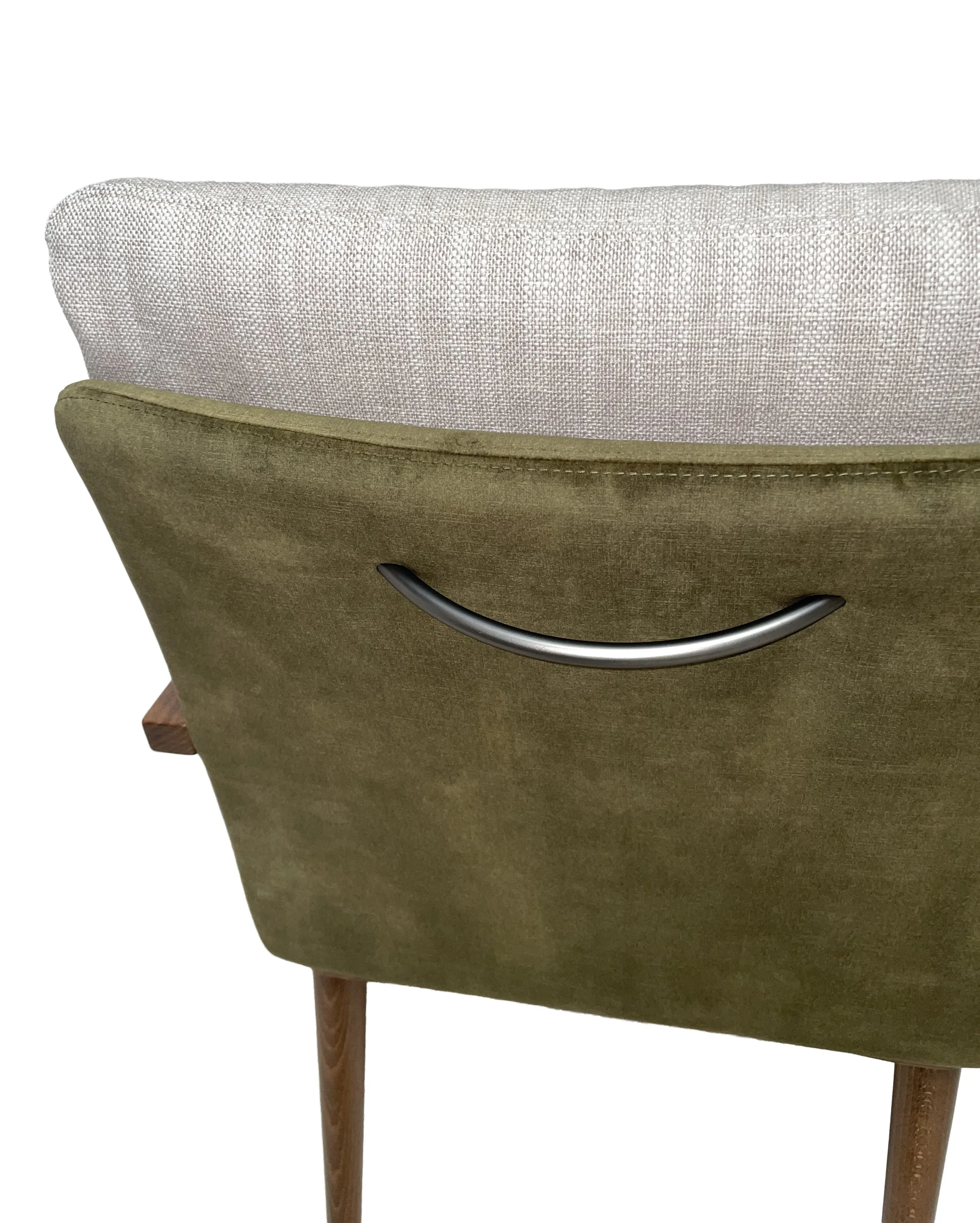 The handle on the Komfy Chair backrest allows the chair to be moved easily.