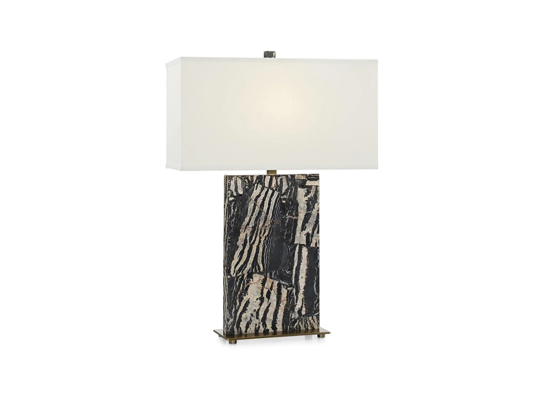 The Nero Table Lamp showcases a bold, rectangular marble slab with striking organic patterns in rich black and white tones.