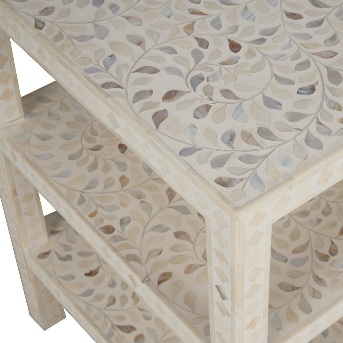 Inlay leaf pattern showcased on an accent table from Chelsea House.