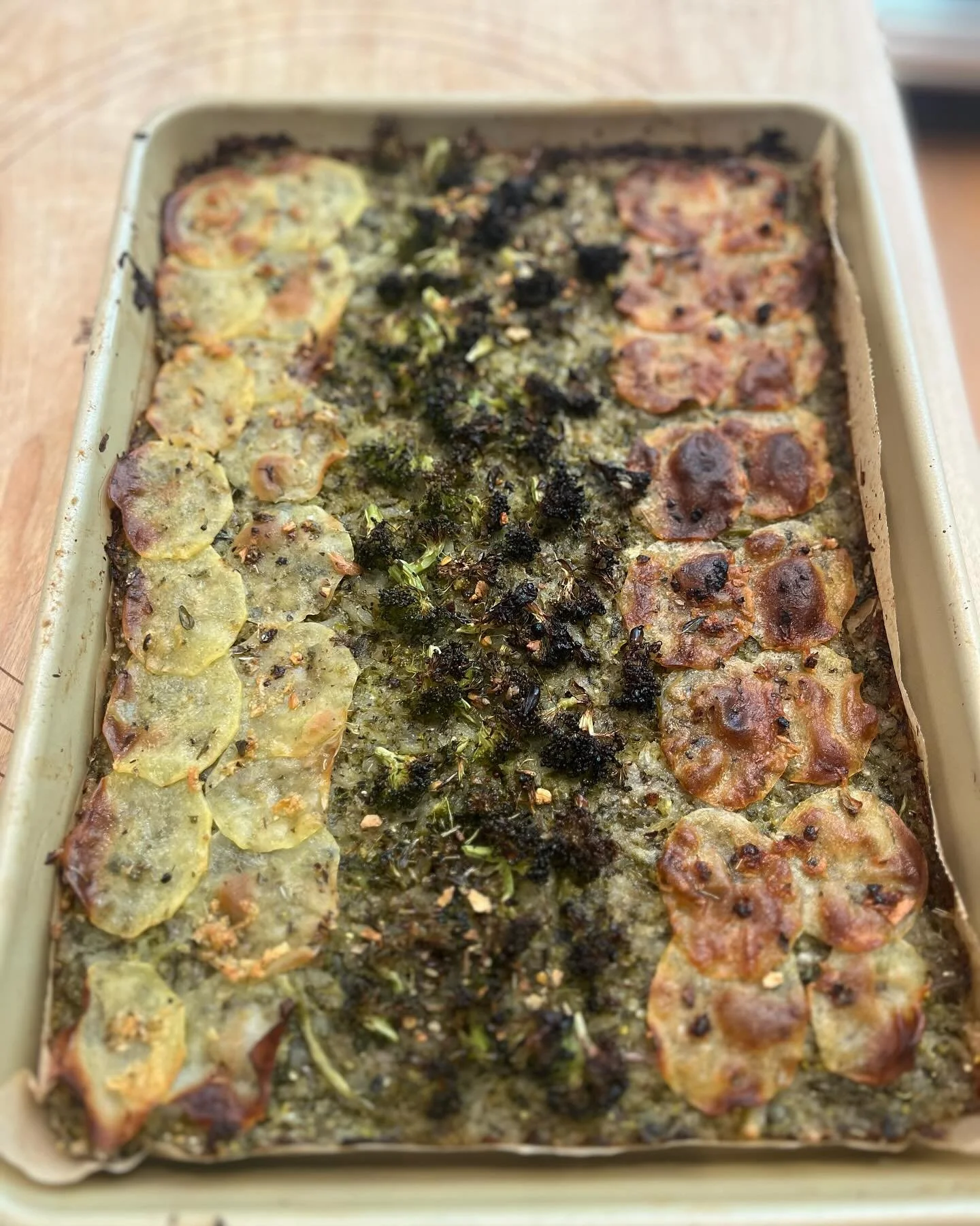 Fun easy bake, great for kids if you want to incorporate more veggies in a way that is tasty. 
Shred potatoes, broccoli, onions in food processor. 
Put it in a bowl, add salt, let it sit for a while
Remove excess water
Add spices of choice, add flour