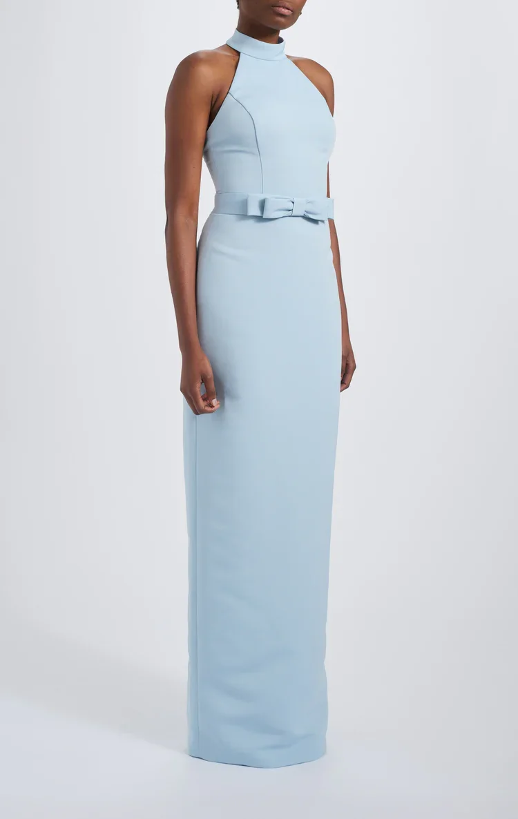 Amsale_Bridesmaids_MIRREN_GB333A_Faille_HighNeck_HalterDress_BowDetail_ColumnGown_Side_750x.webp