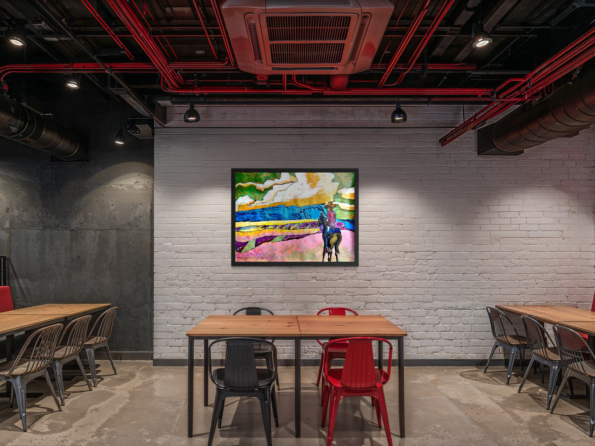 Modern restaurant interior with white brick walls, featuring a colorful abstract painting of a person on horseback, with wooden tables and metal chairs, and exposed ceiling pipes painted red.