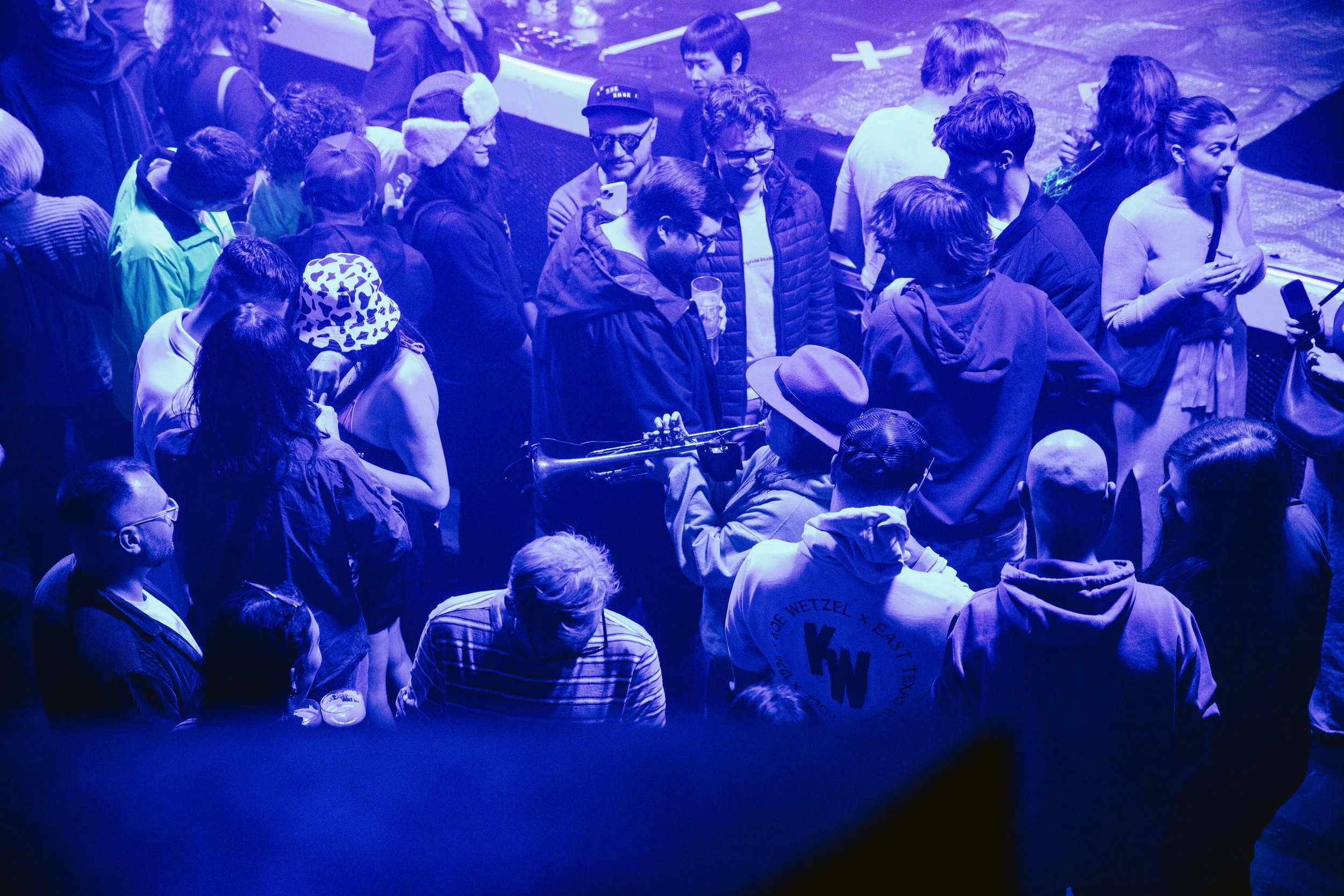 Photo of Robyn Rocket playing in the crowd at fabric photo by  Sian O'Connor