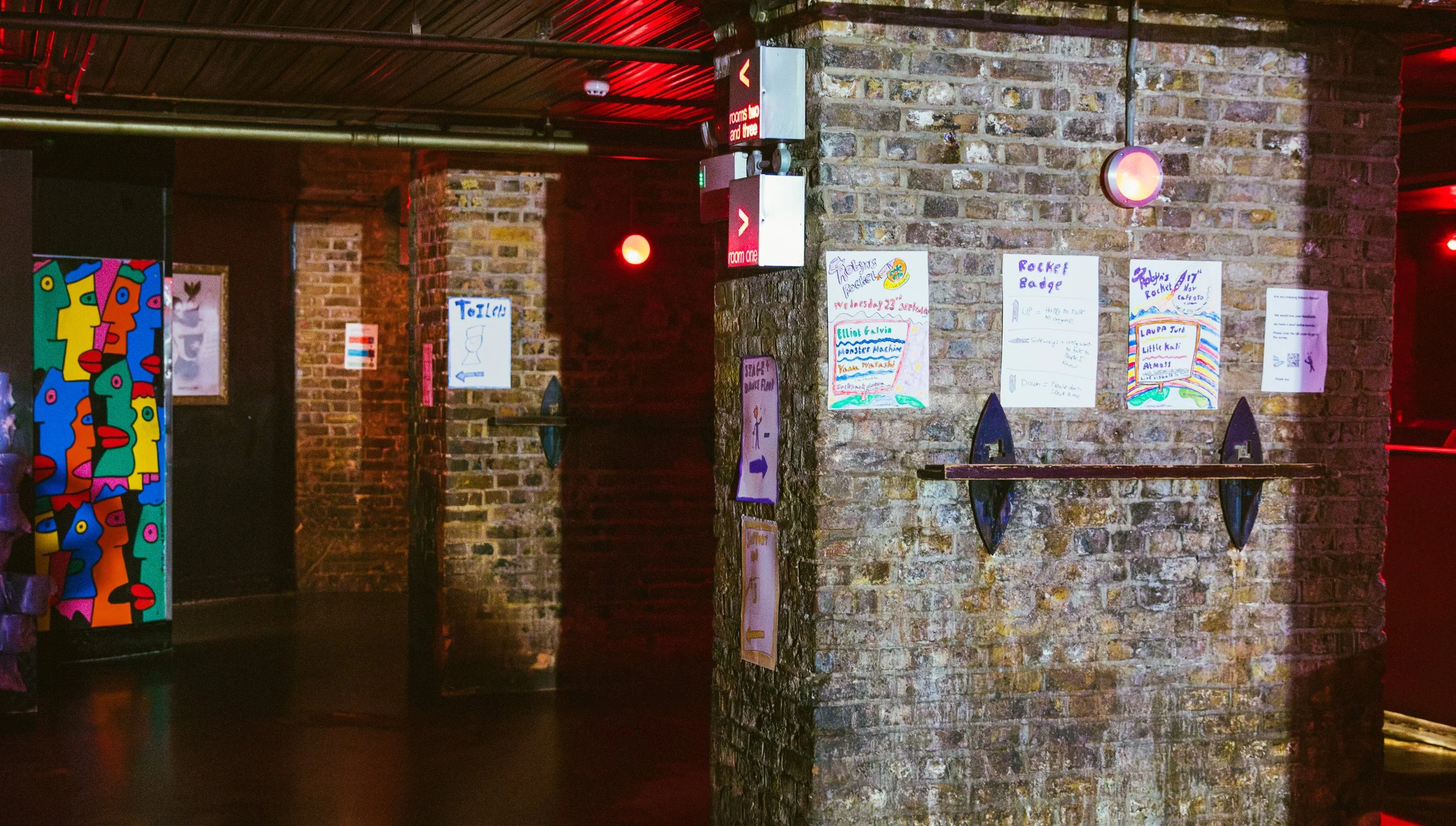 Photo of posters / signs made by Robyn Rocket at fabric photo by Sian O'Connor