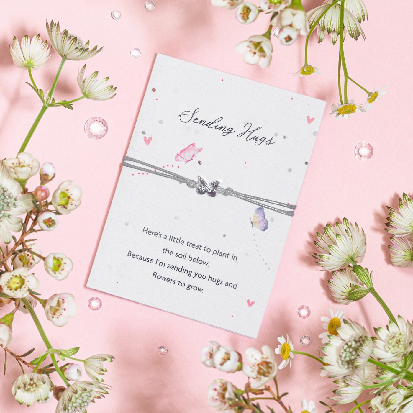 Sending Hugs seeded wildflower card with grey wish bracelet, eco-friendly gift from Letterbox Love