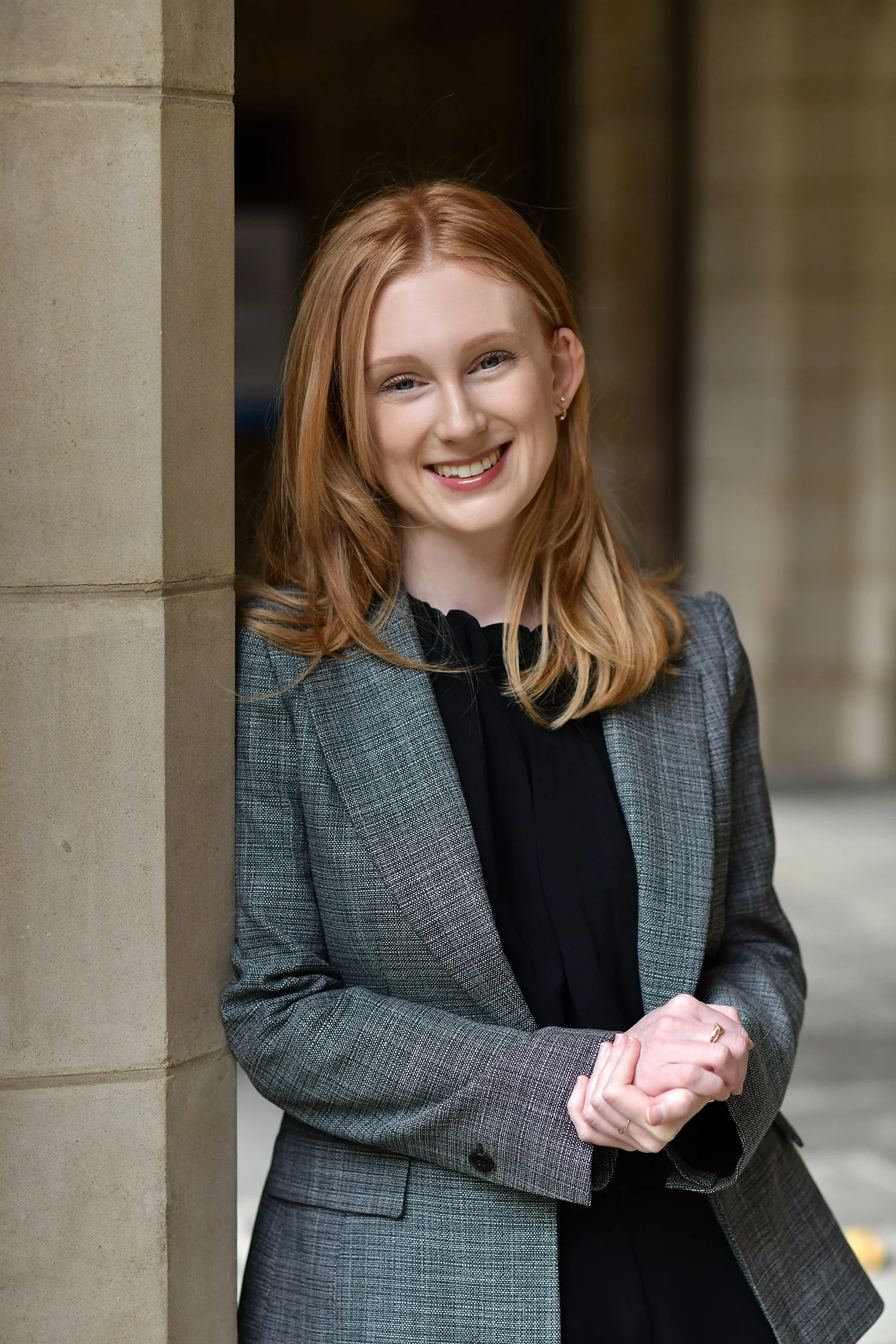 Professional portrait photography of a young red headed girl and Melbourne University graduate by David Fowler
