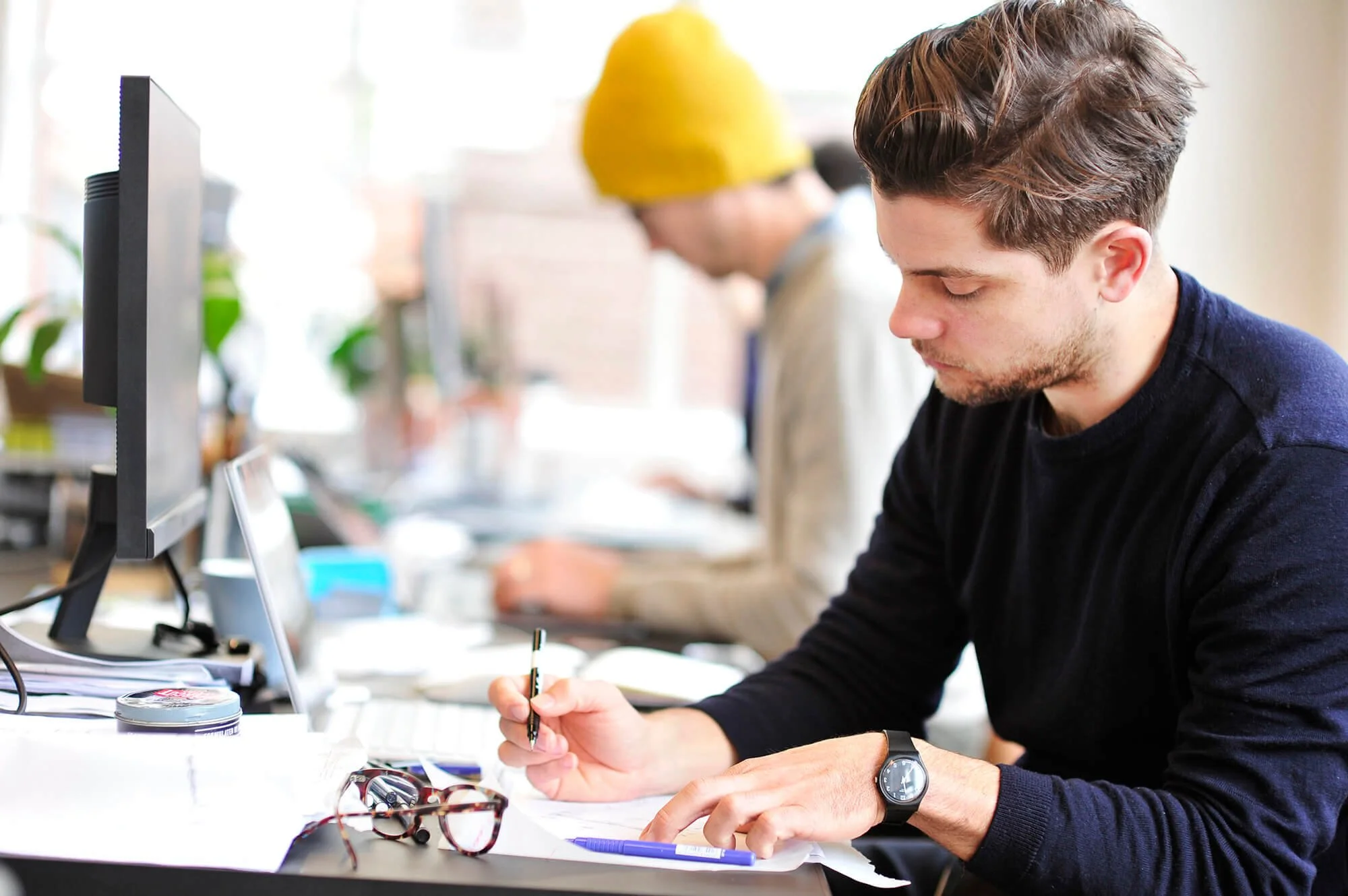 Corporate and commercial photography Melbourne, photograph of men working in an office by David Fowler