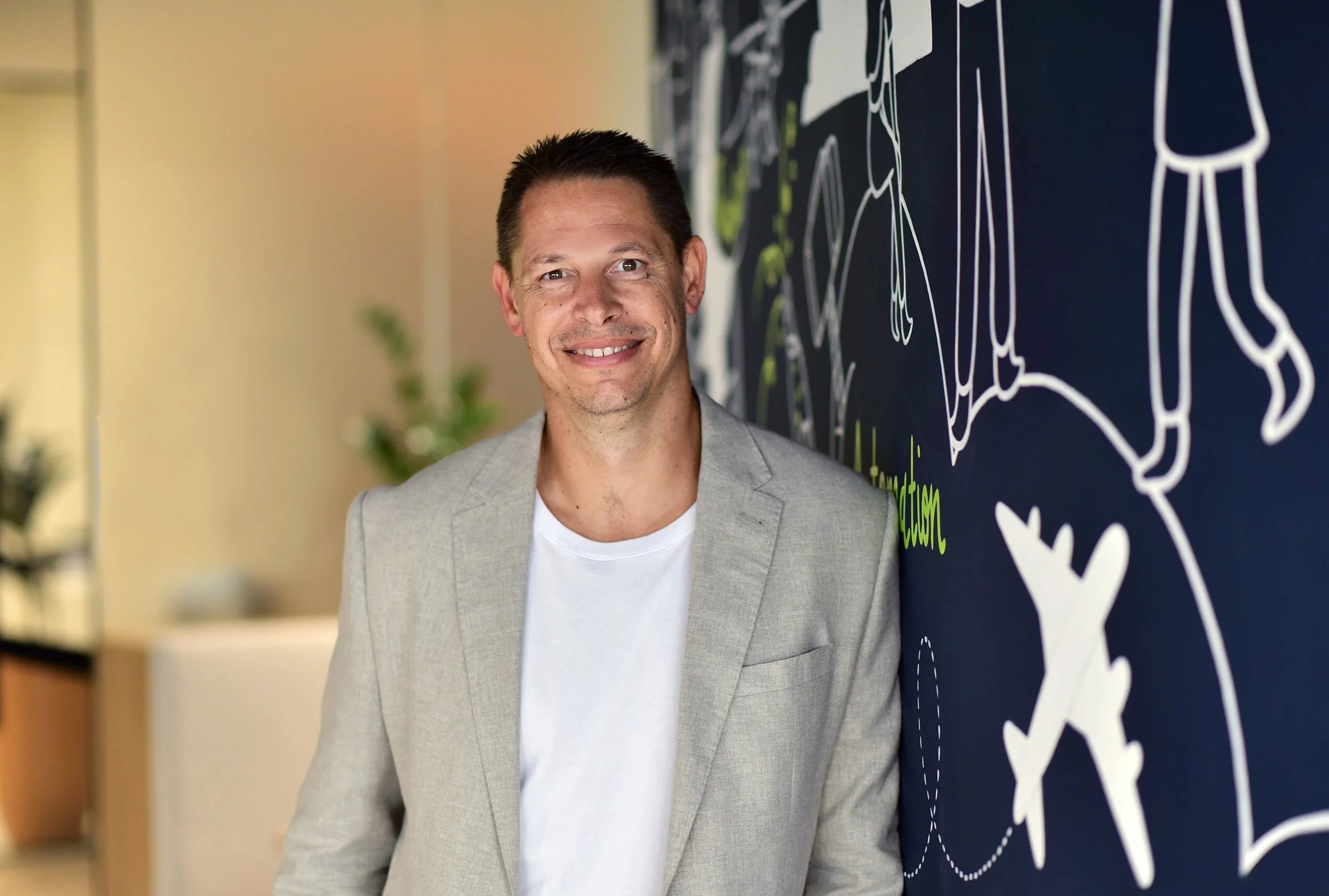 Relaxed portrait of a Company director in office.jpg