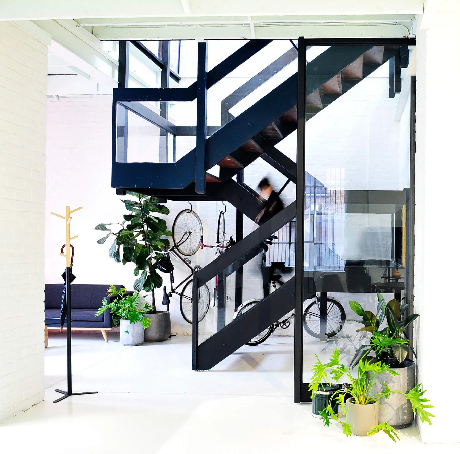 Corporate and commercial photography Melbourne, interior architectural photograph of a building with a black steel staircase by David Fowler