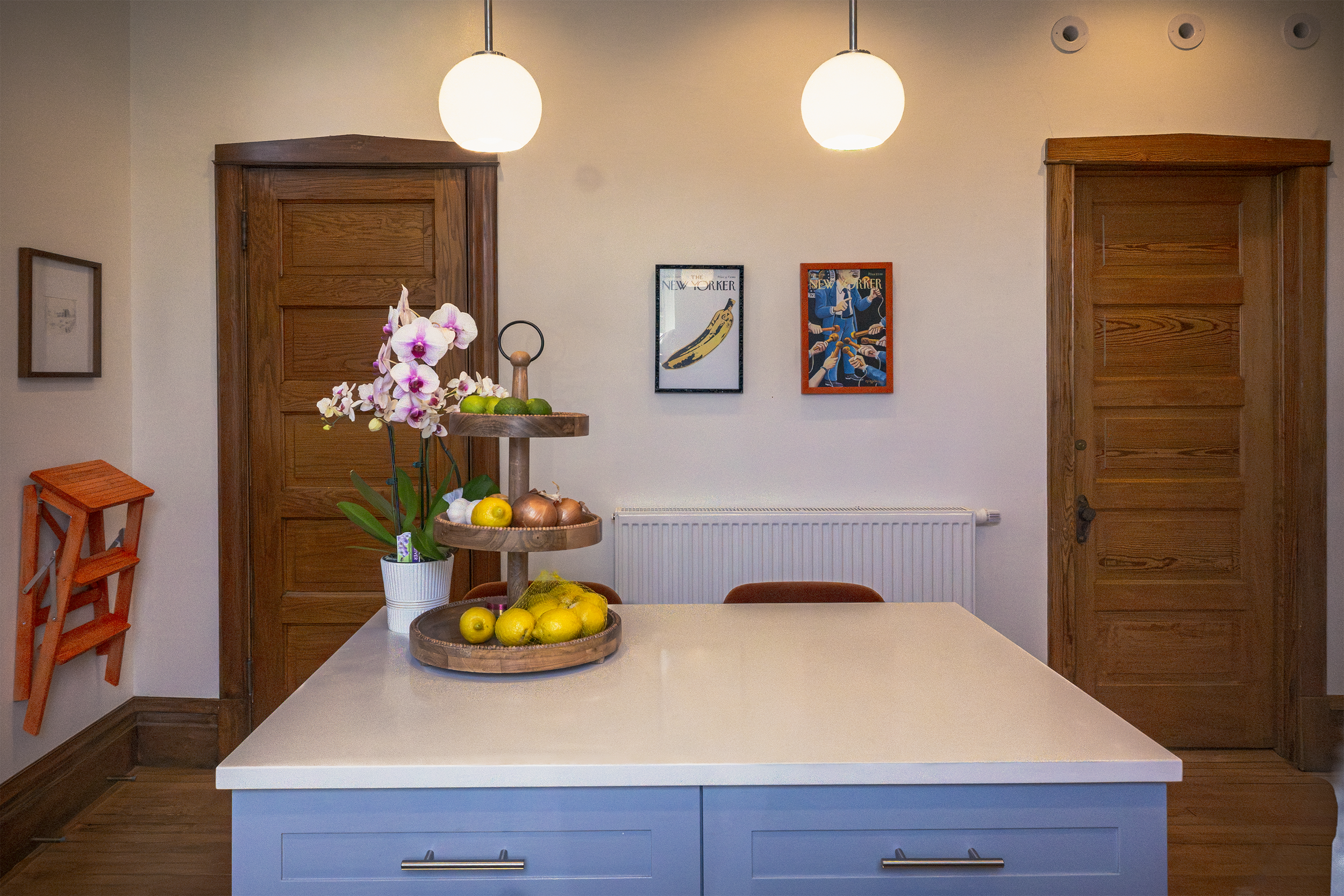 Built-in cabinet and hallway vignette in a historic Chicago home renovation by Clarke Architecture and Design