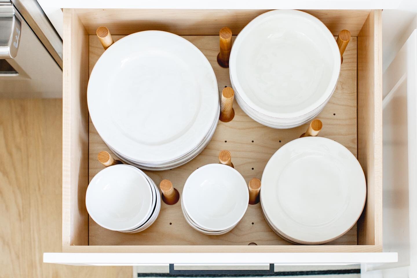 Have you ever thought about storing your plates in a drawer? It&rsquo;s actually one of our favorite ways to store plates and these maple racks make it so easy to put dishes away after washing them! Not only are they beautiful but they are so functio