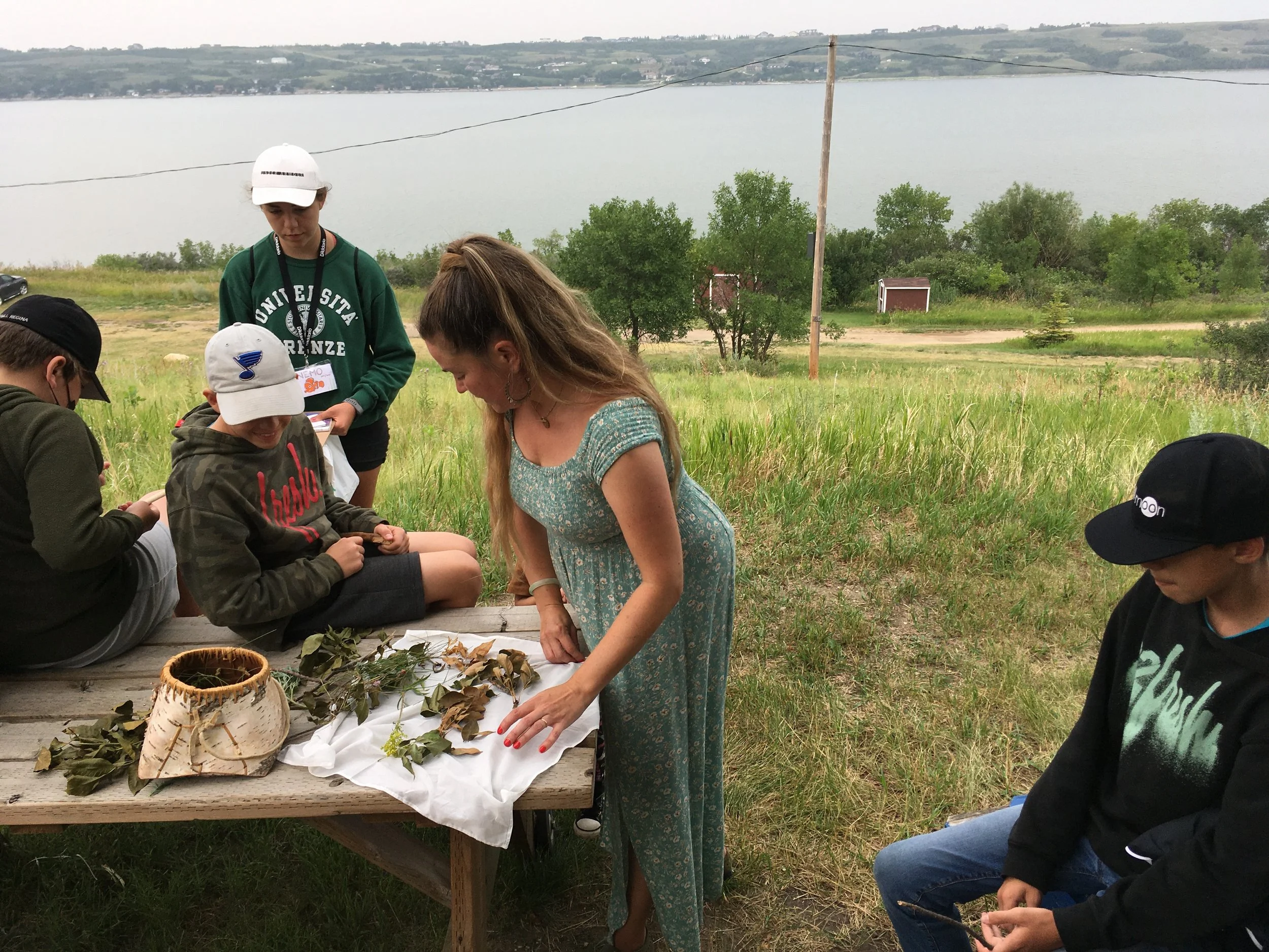 Melanie sharing foraged botanicals in preparation for eco printing