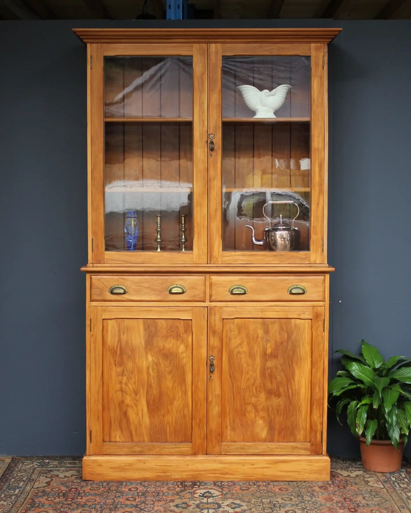 Antique Kitchen cabinet.&nbsp; Originally this piece came from New Zealand and it looks very much like Rimu timber, which is a native NZ tree.&nbsp;&nbsp;
Beautiful colour with lovely grain.&nbsp; Larger than normal, glazed upper section, the bottom 