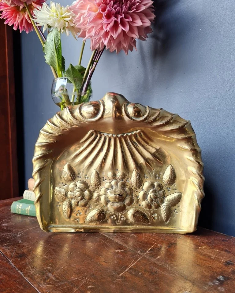 Such a pretty antique Victorian brass dustpan with raised floral design. It has a small area worn through where a very conscientious housekeeper has rubbed it away in their cleaning :)
It measures 230mm across
$60
Postage $12.95 Australia wide. 
Comm