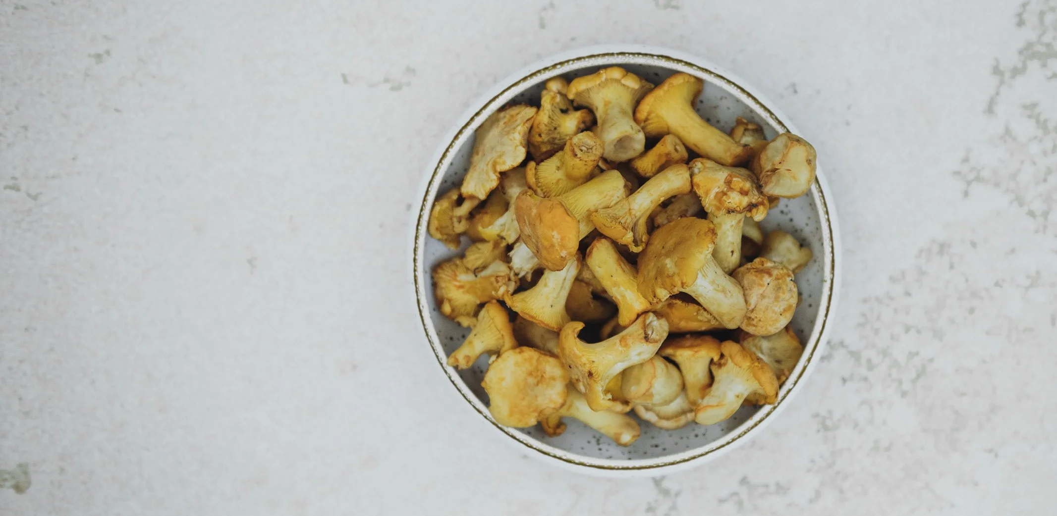 Frische Eierschwammerl als Ausdruck der saisonalen Küche im ANIMO by Aigner