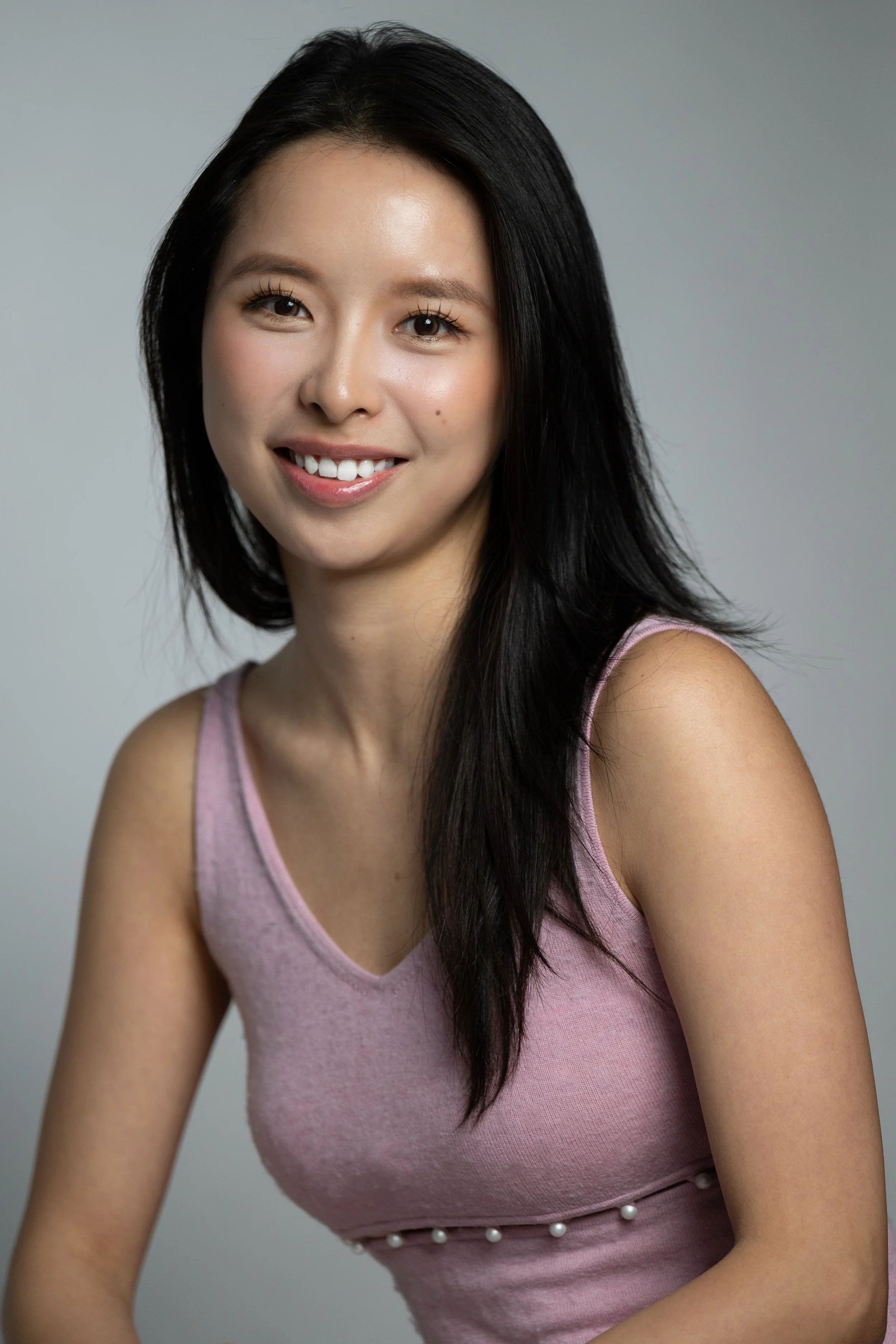 Beautiful asian woman smiling for her portrait headshot