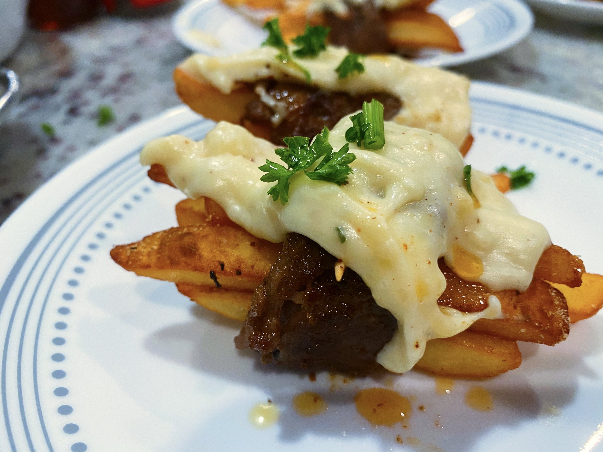 Steak Frites topped wtih Chef Reese Special  French Sauce!