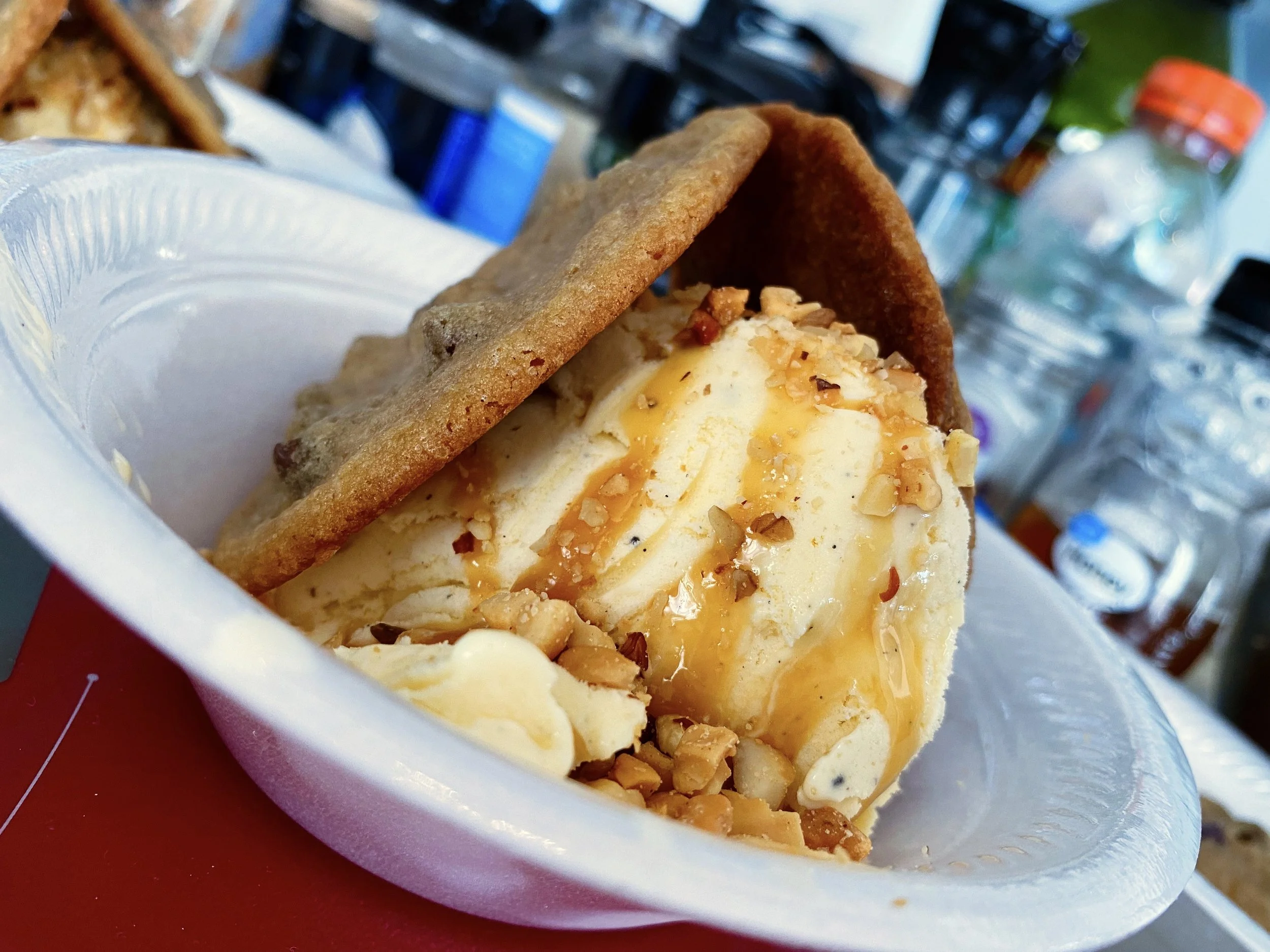 Soft Baked with a little Crunch Chocolate Chip Cookies with French Vanilla Ice Cream Topped with Caramel Drizzle and Dessert Nuts!