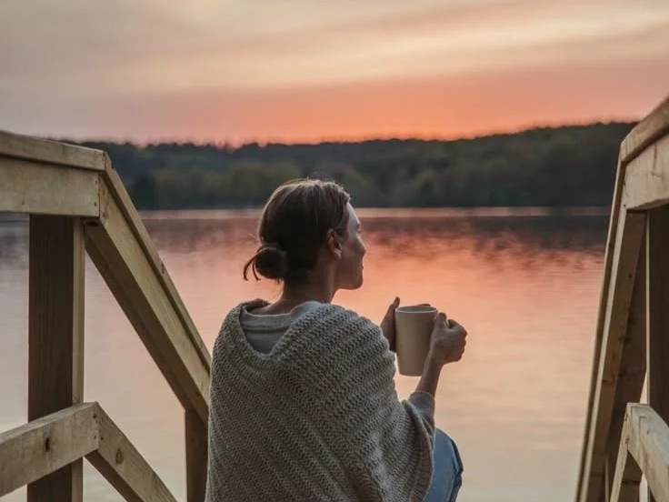 woman thinking quietly with coffee