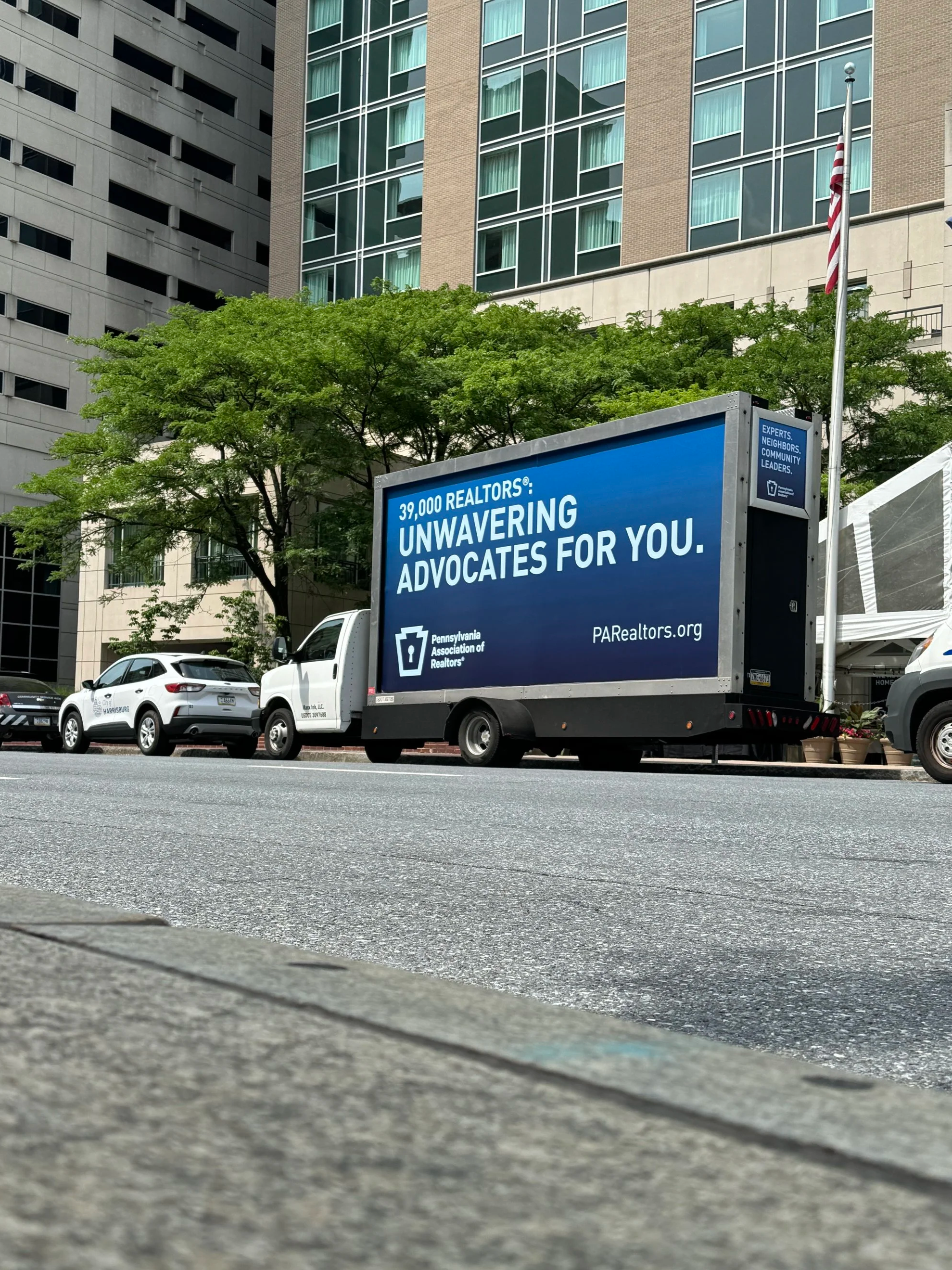 Mobile sign during Realtor® Hill Day