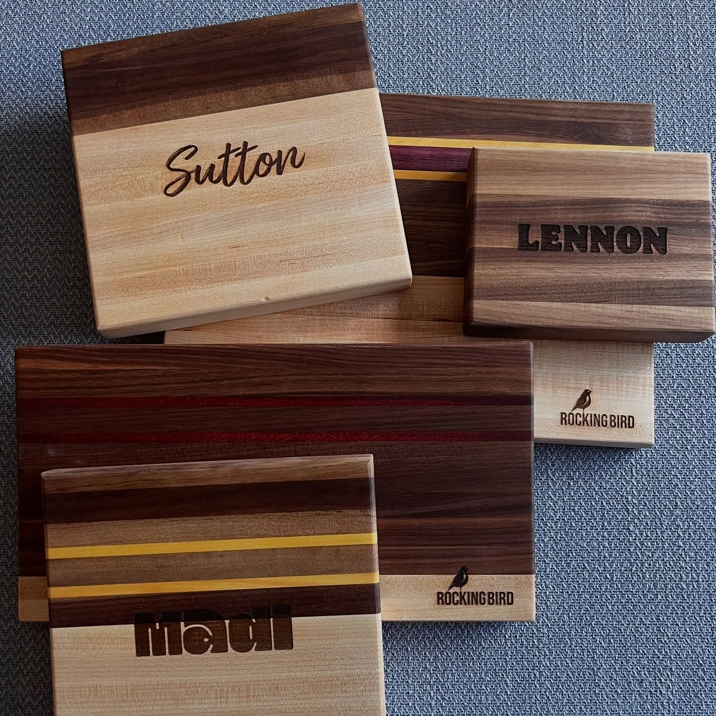 Cutting boards for the whole family #chicago #juniorchefs #woodworking #cookingwithkids #homedecor #cuttingboards #walnut #maple #yellowheart #purpleheart #padauk