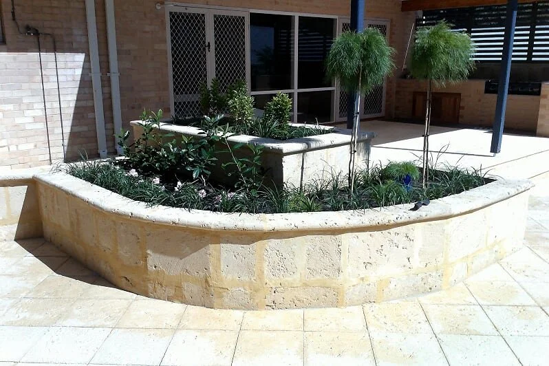 Limestone garden bed