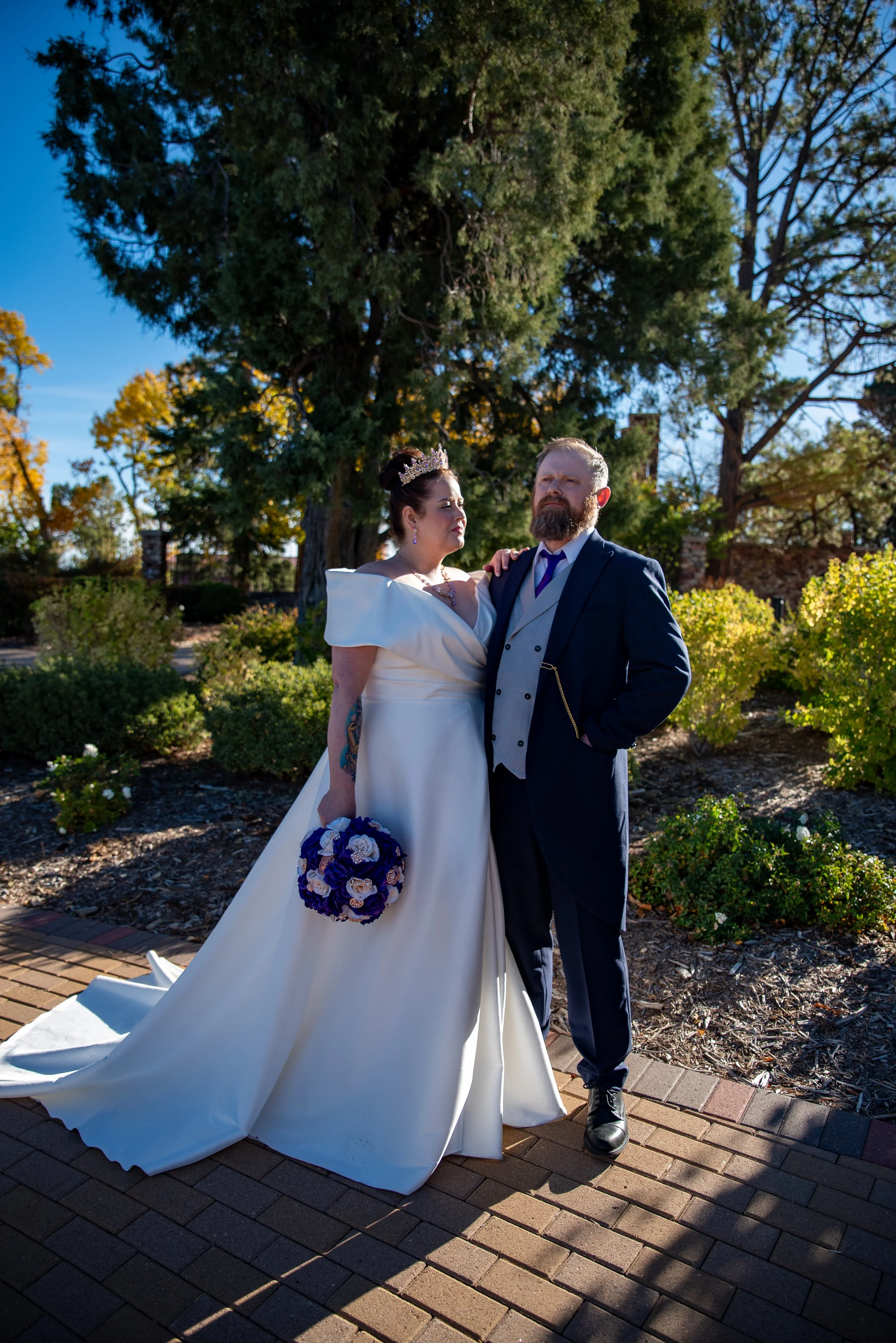 Bride and Groom pose for a beautiful elopement at the Highlands Ranch Mansion.