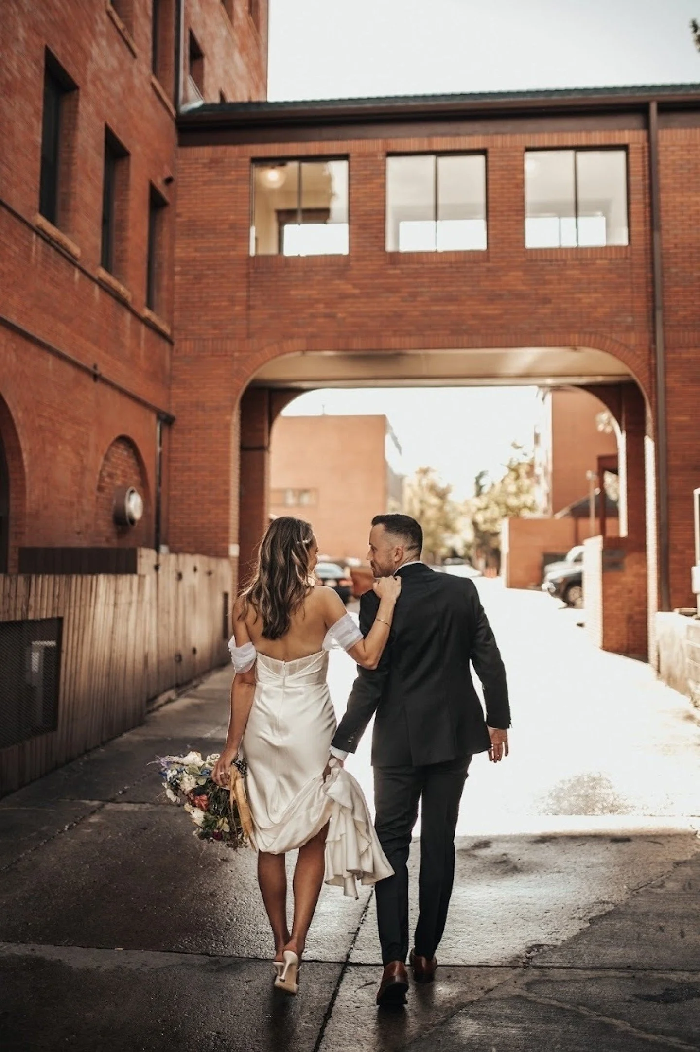These two making the alleyway look chic

Photographer @bayleeshaephoto
Venue: @rembrandtyard
Dress: @bhldn
Hair/Makeup: @beautyandthebabesco
Florist: @plumeandfurrow
Planner: @heirloomeventsdesign
Second Shooter: @enspirestudios