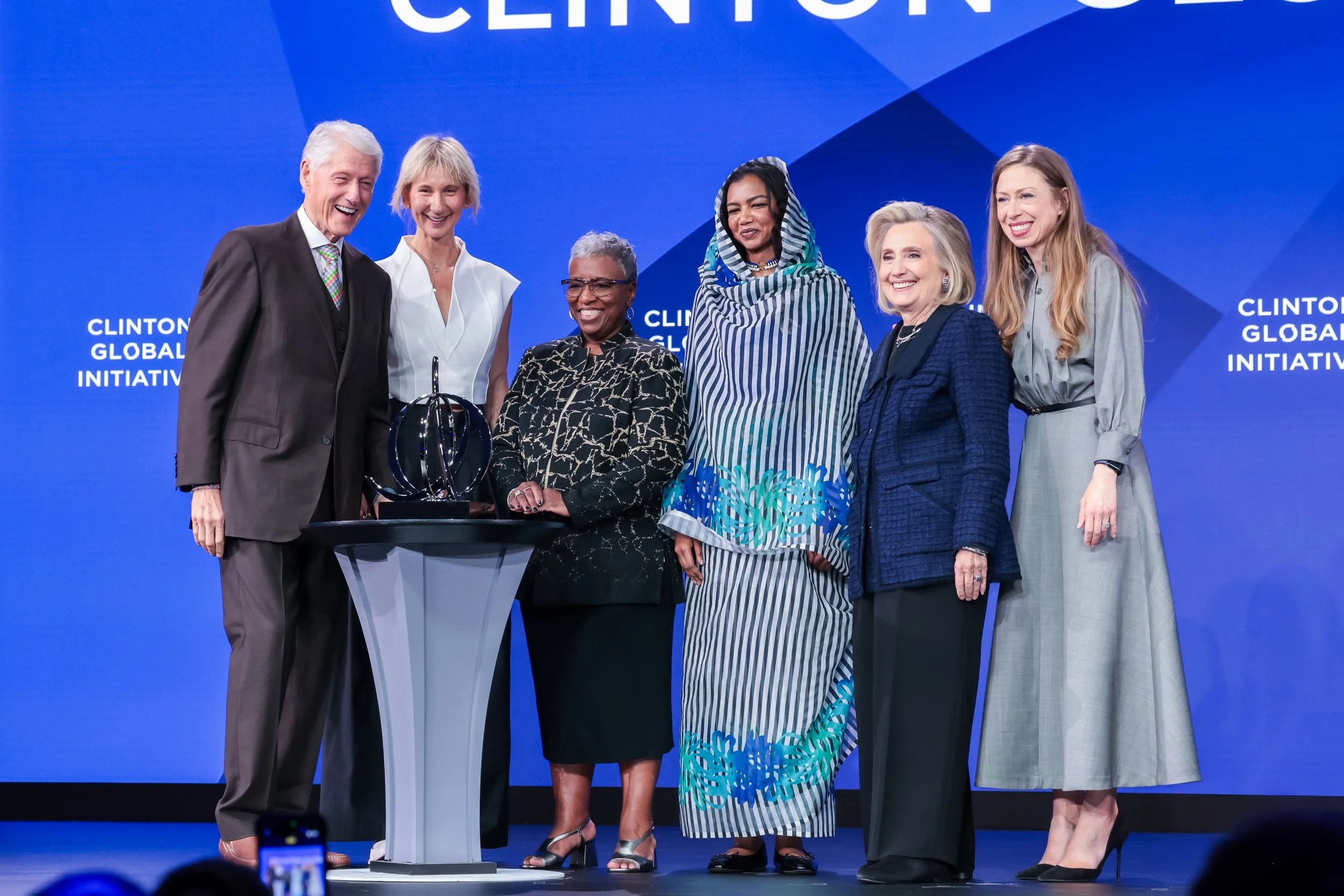 Bill, Hillary, Chelsea Clinton with Beneficiaries 