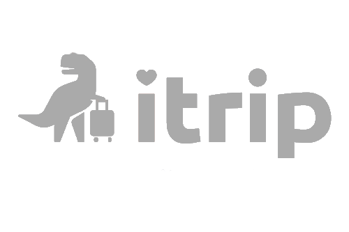 Dinosaur sitting with a suitcase next to the text 'i trip' with a heart symbol.
