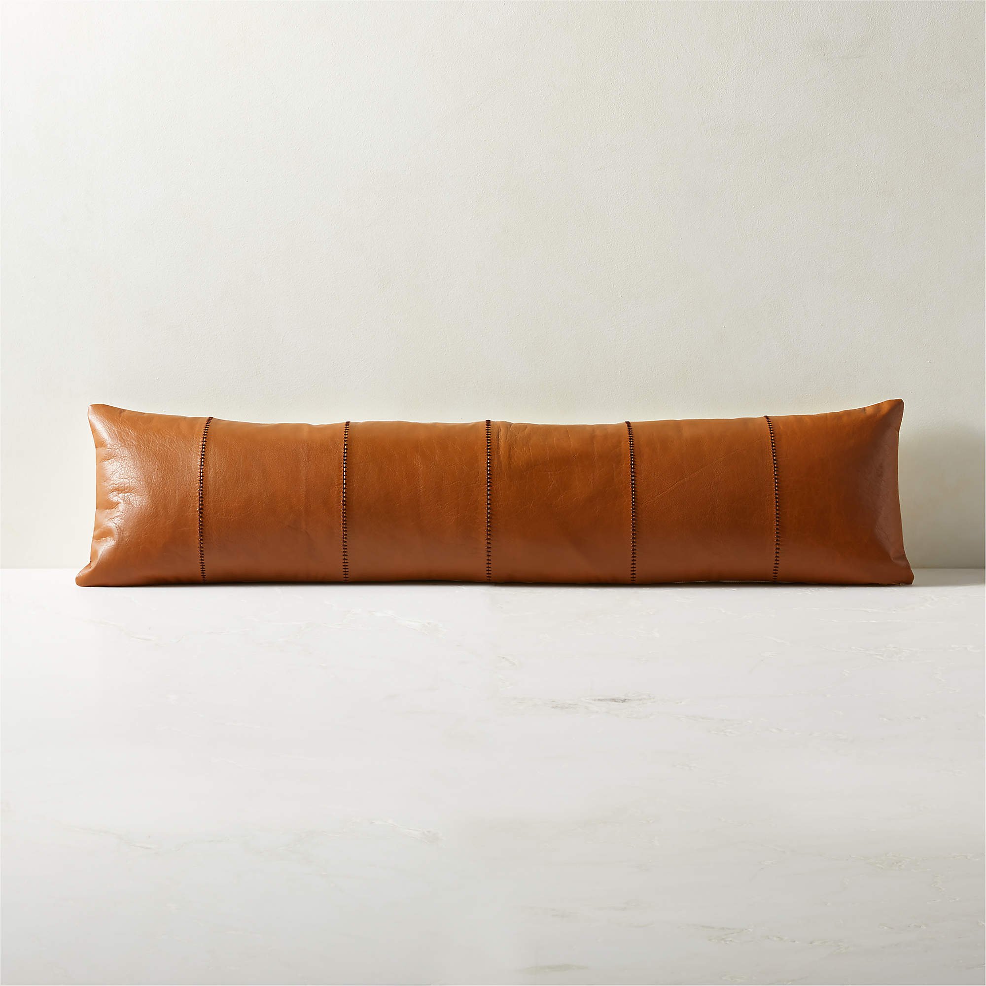 48x12-artigo-brown-leather-pillow.jpg