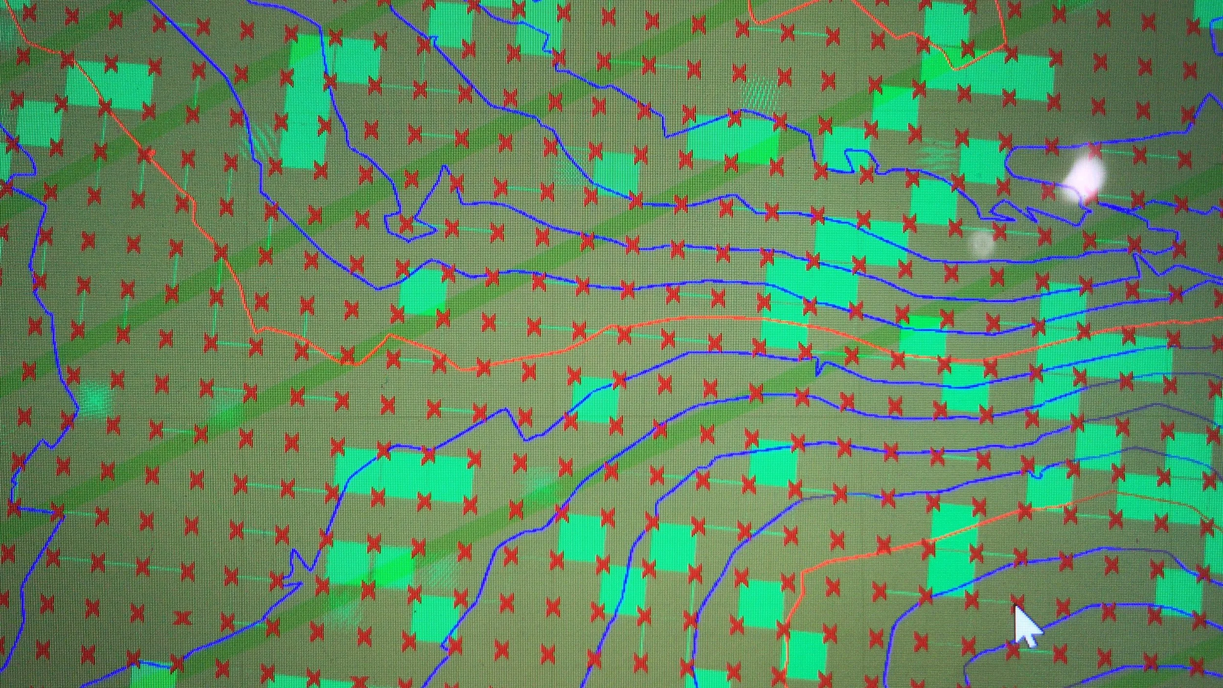 A digital map displaying roads, streams, parks, and numerous red X marks overlaid on a green terrain background.
