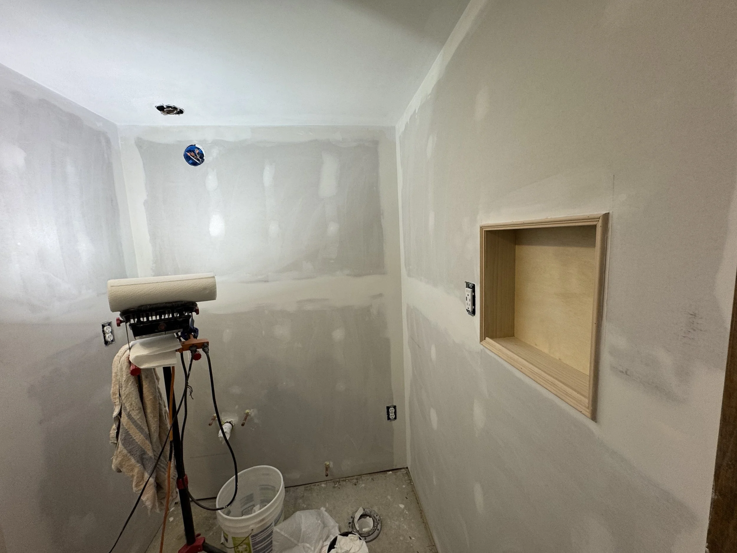 Simple wall inset was constructed for device charging.