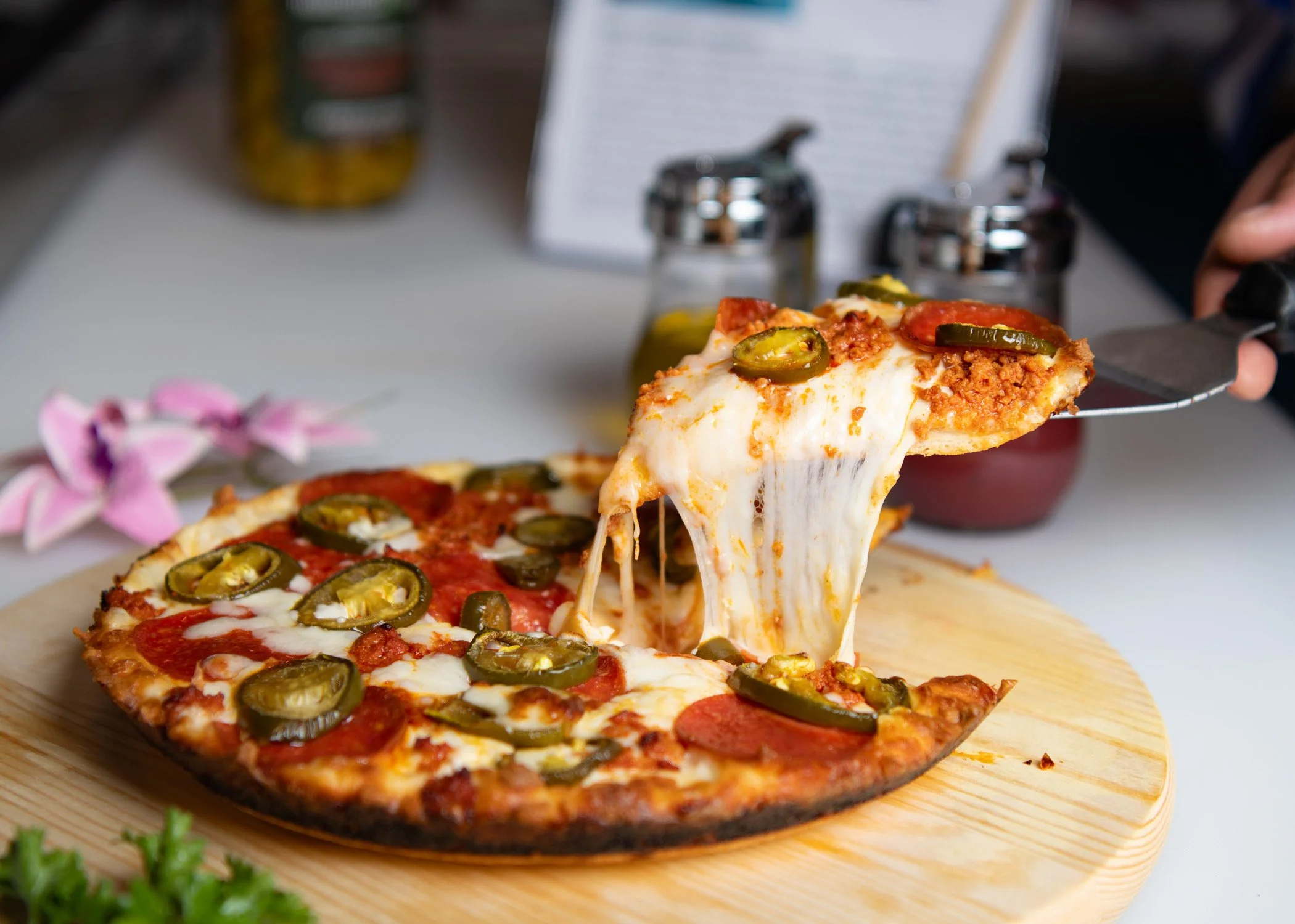 Pizza from Latino's Pizzería .