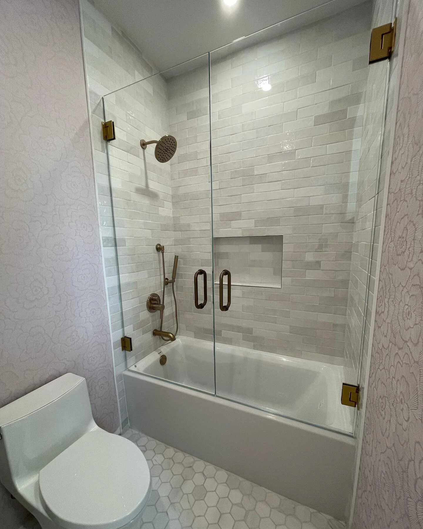 Check out these over the tub shower enclosures we installed at this newly remodeled home in Pinecrest. For the tubs we installed a double door for easy access to the water handle. Client requested it this way so it would be easier to bath a toddler.
