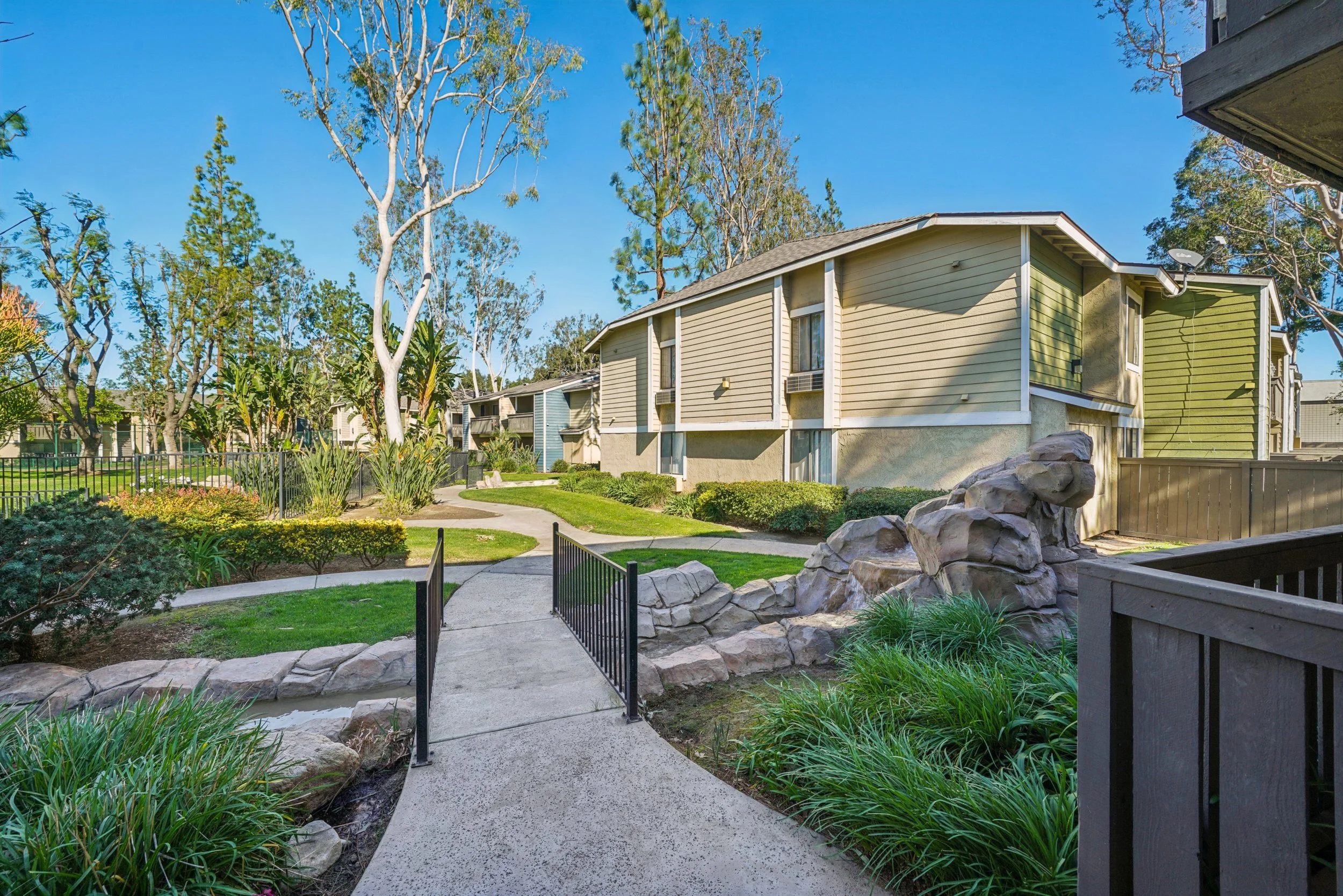 Our lush well-kept landscaping & walkways at River Oaks