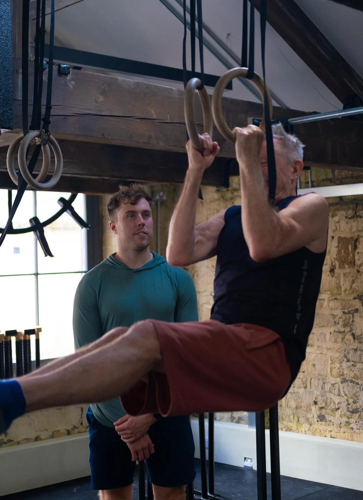 Paul training on the rings at CaliUnity