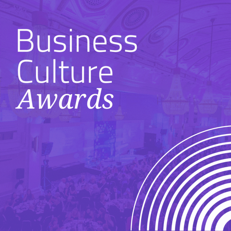 Event poster for the Business Culture Awards featuring a reception hall with chandeliers and attendees, with a purple overlay and white text.
