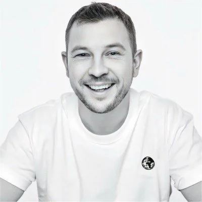 Smiling man in a white t-shirt